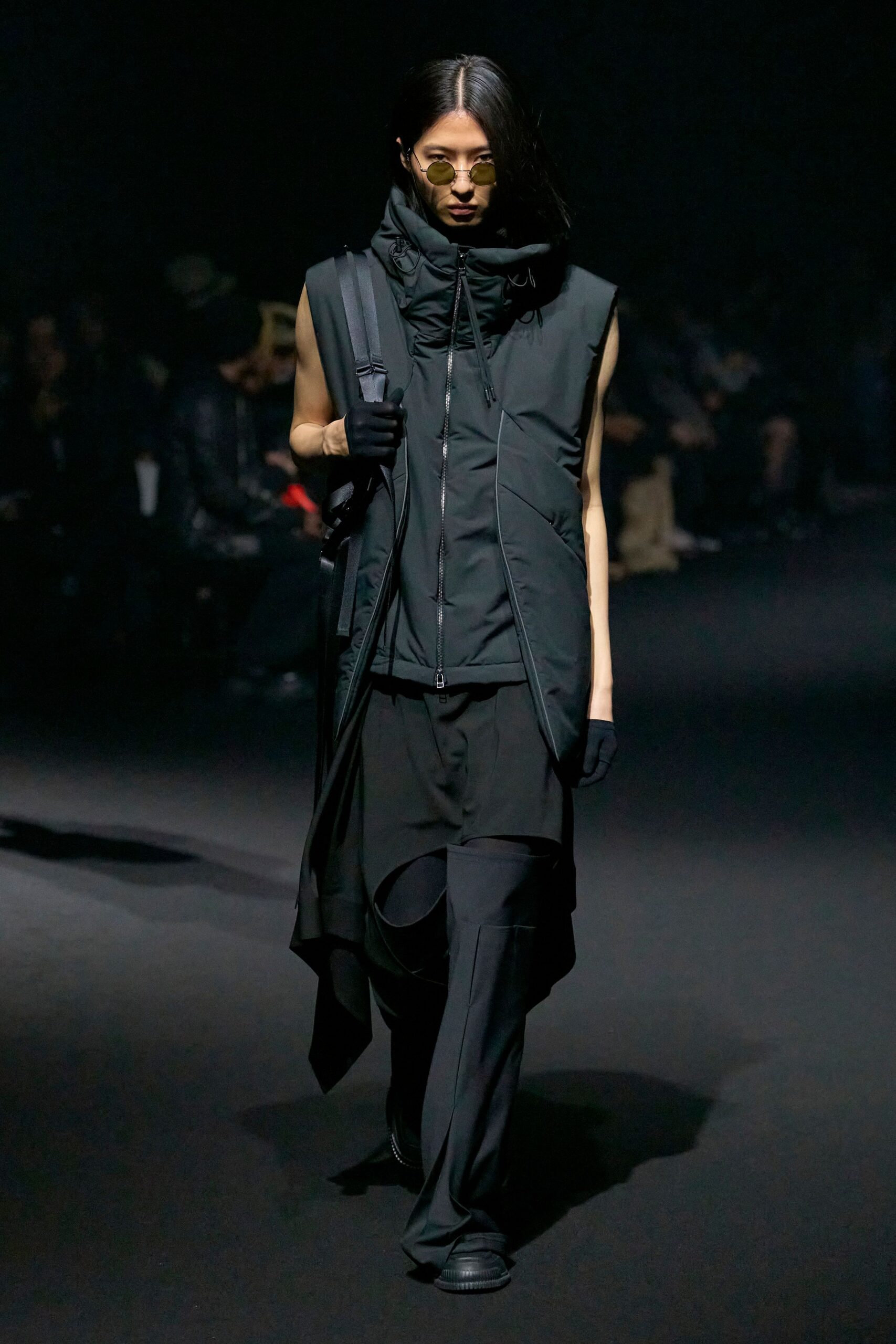 black relaxed sleeveless jacket with fitted pants