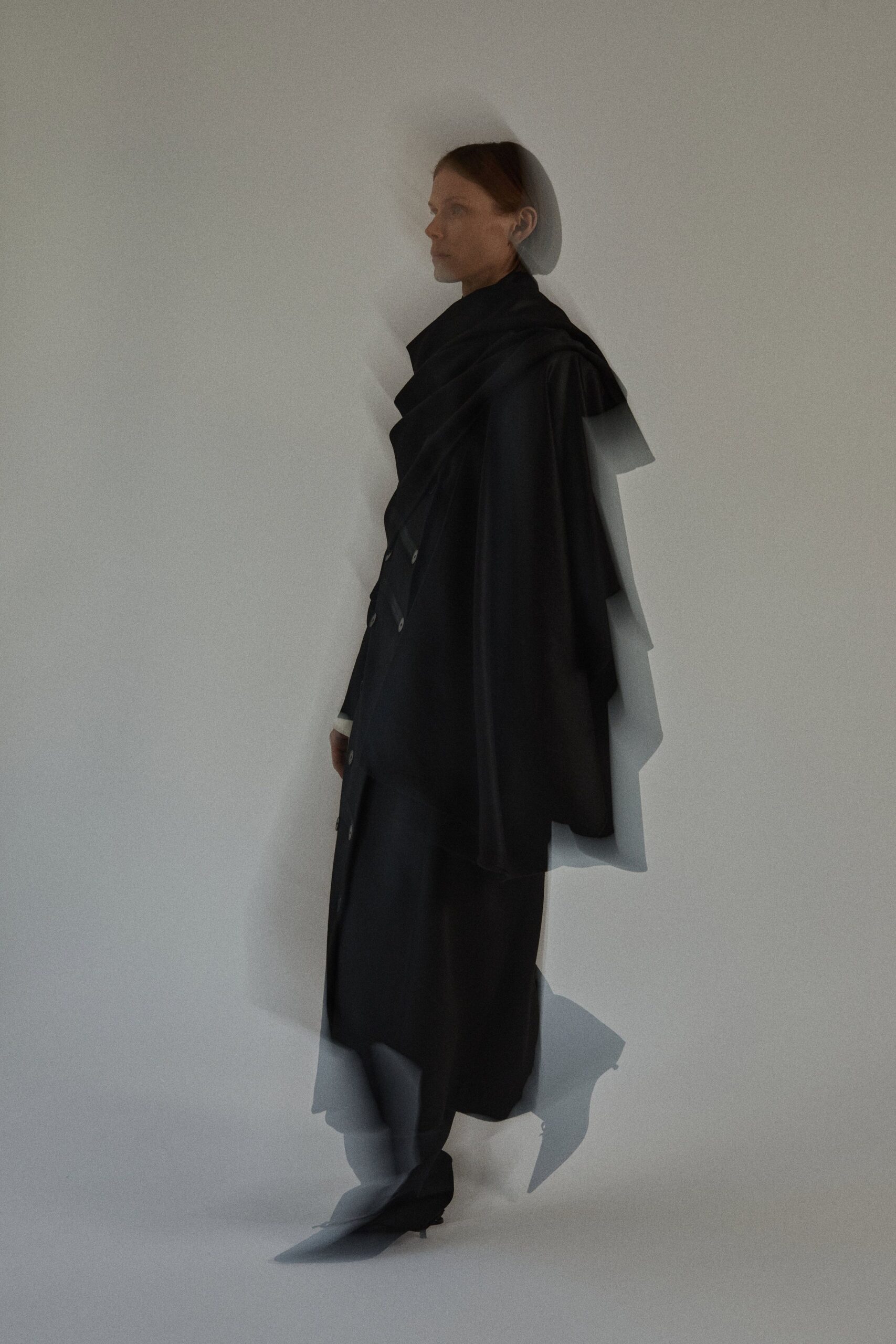 black silk long-sleeve collared relaxed draped flowing coat