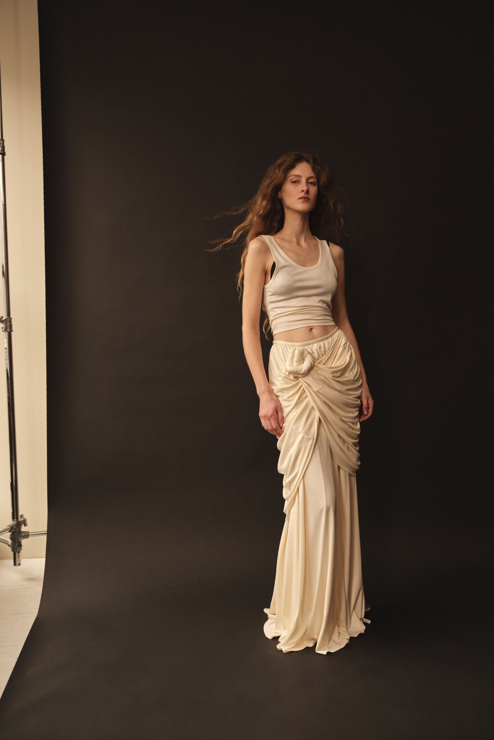 beige silk sleeveless top and ivory ruched skirt