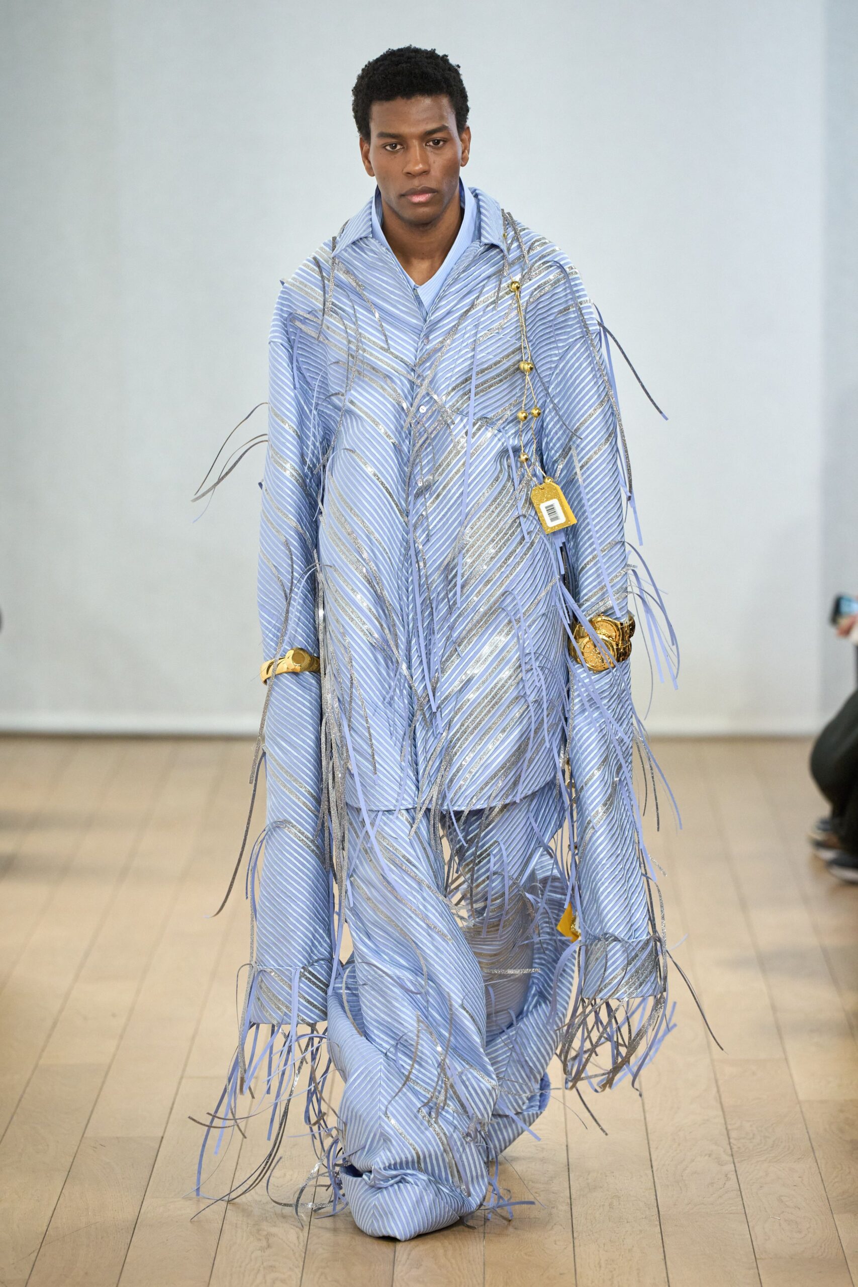 blue and white fringed coat