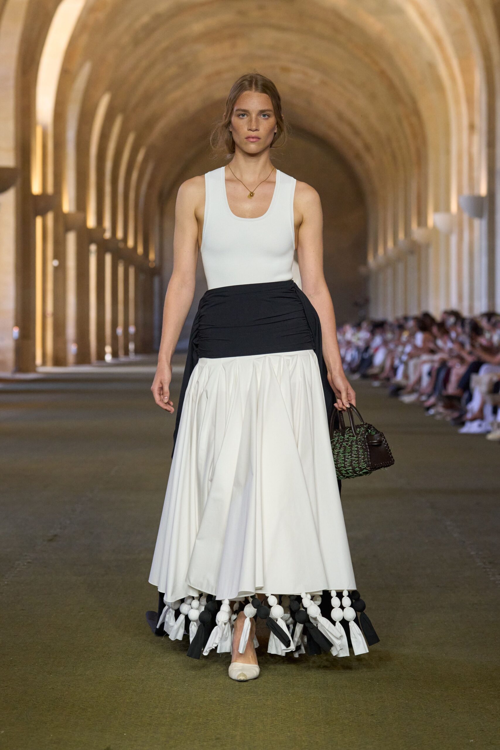 white fitted top black and white skirt