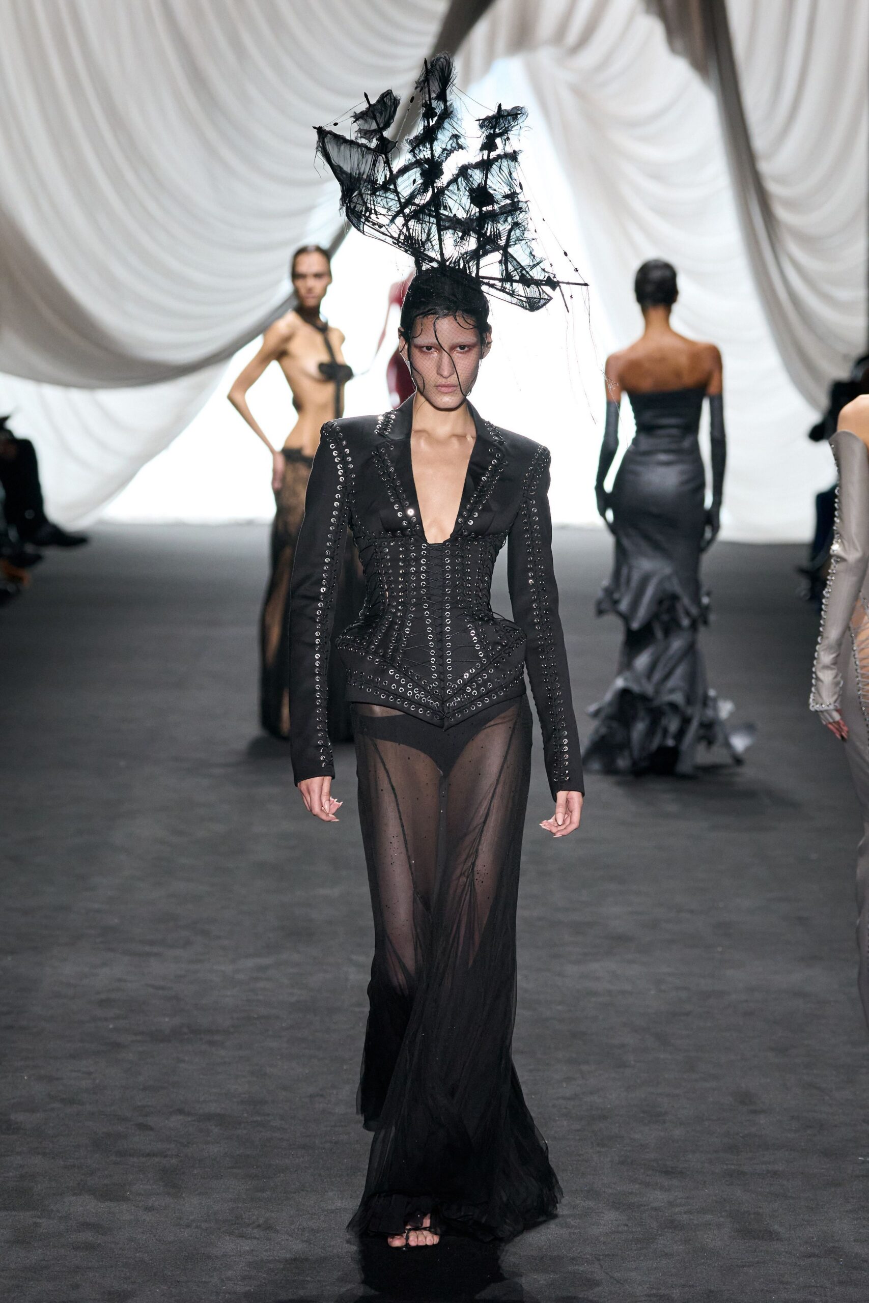black silk gown with structured jacket