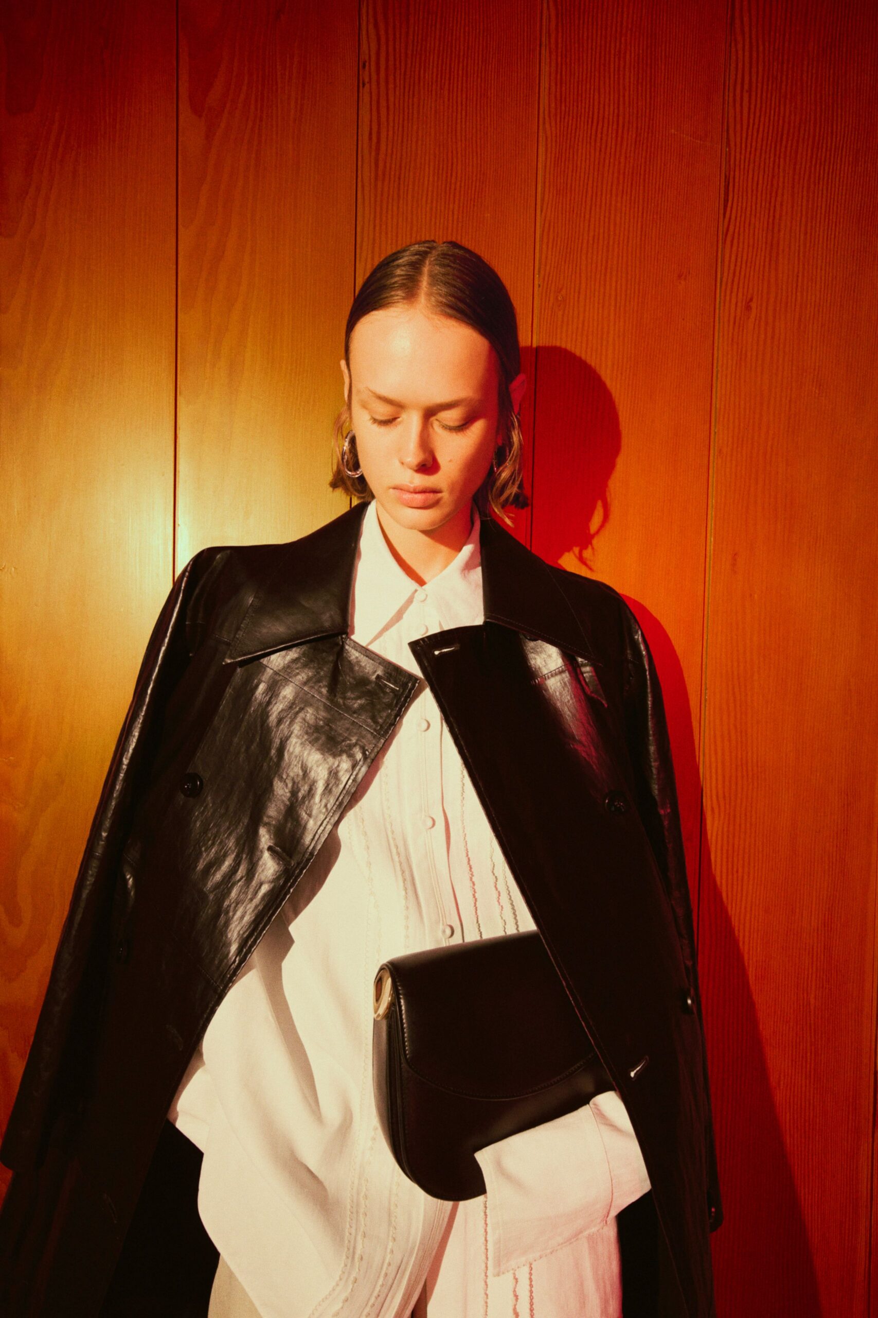 black leather coat with white shirt