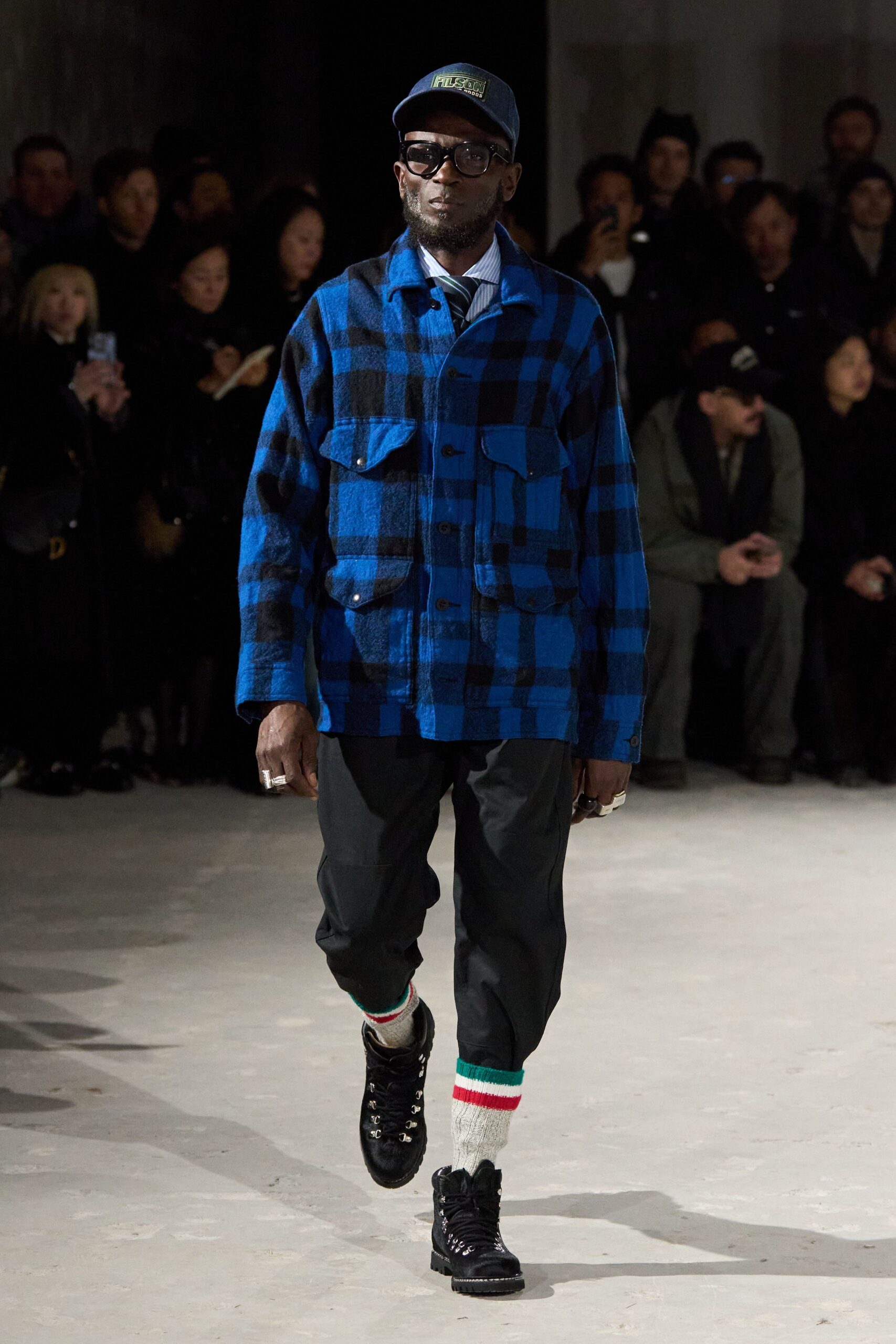 blue checked jacket with black pants