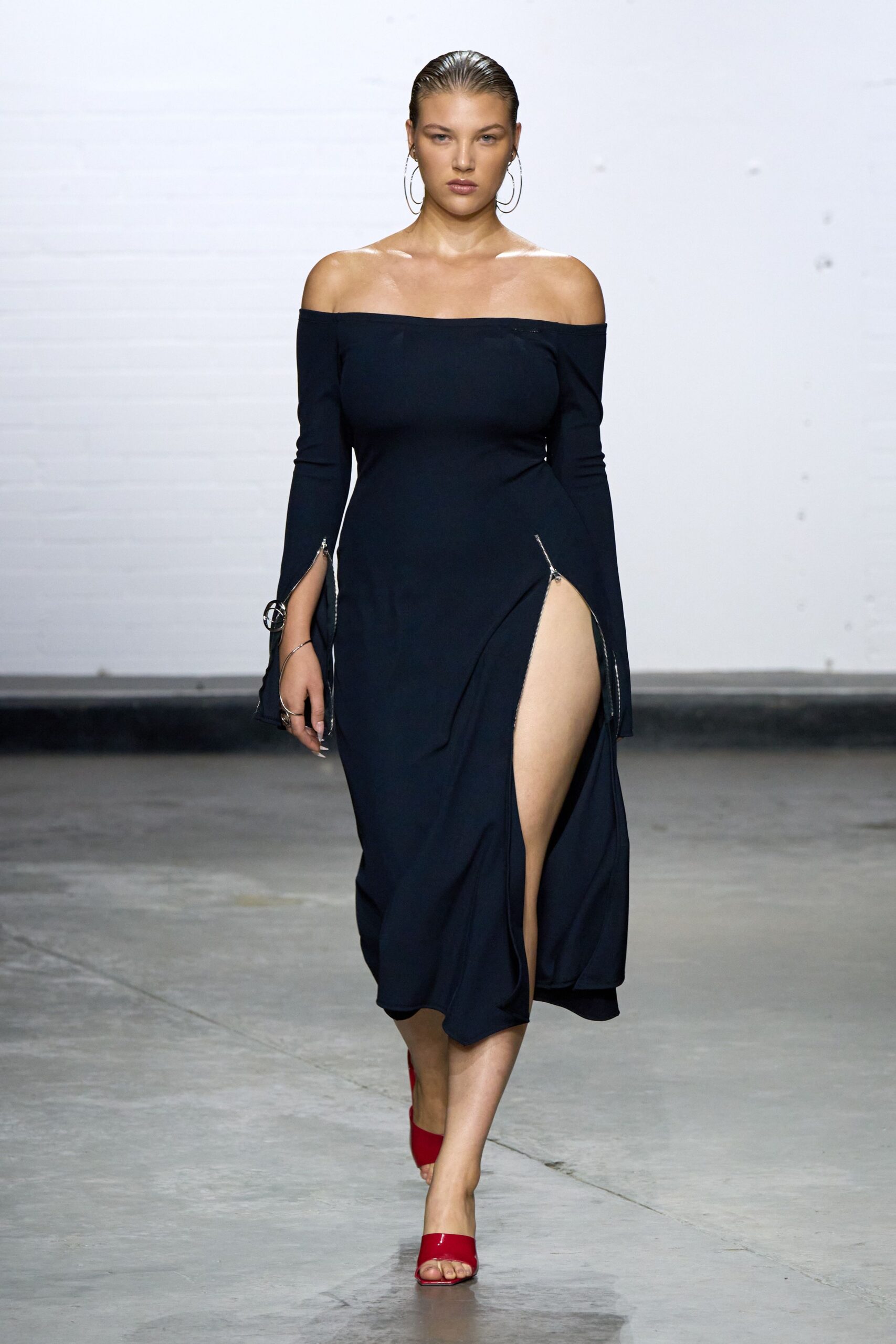 black off-shoulder midi dress with red shoes