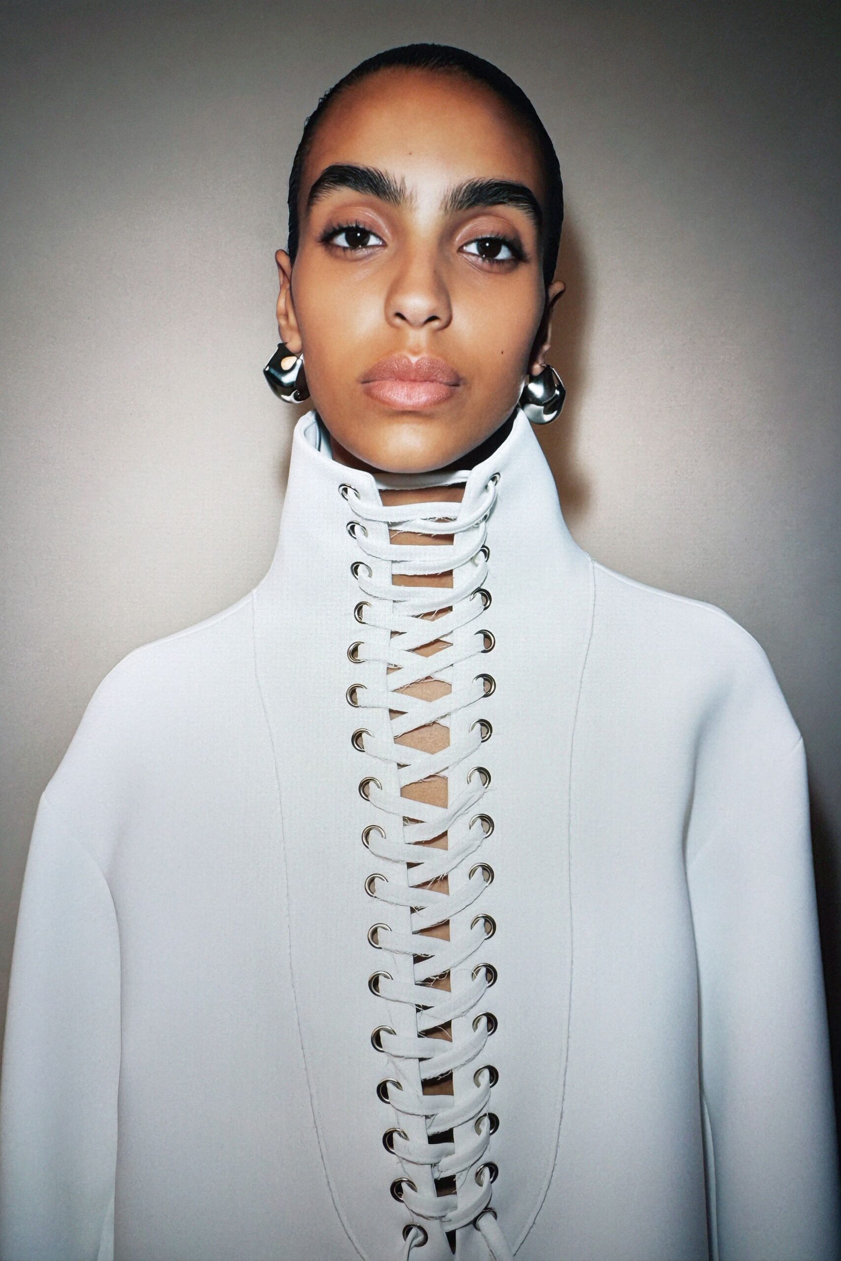 fitted white high-neck top
