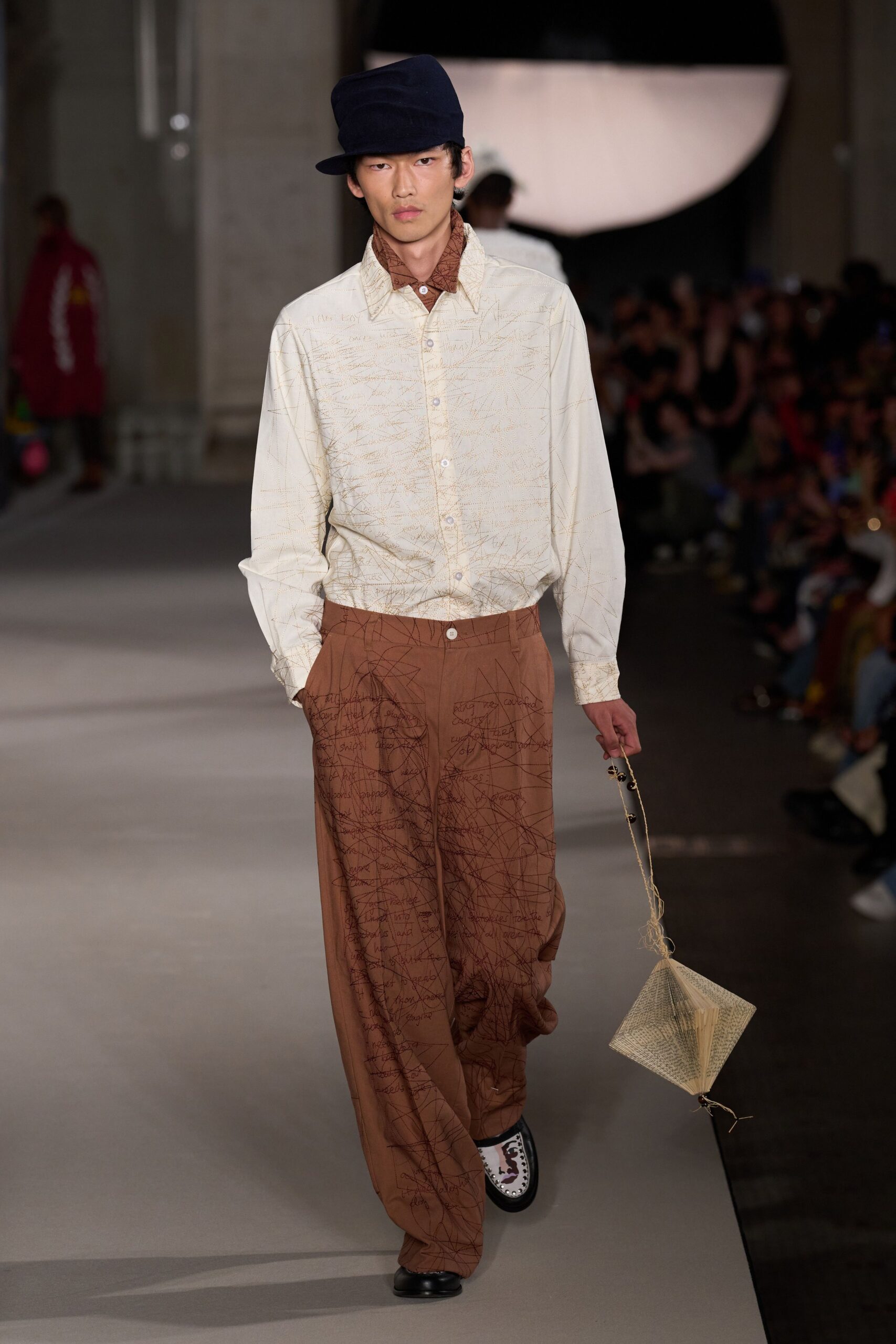 white printed shirt brown wide-leg pants