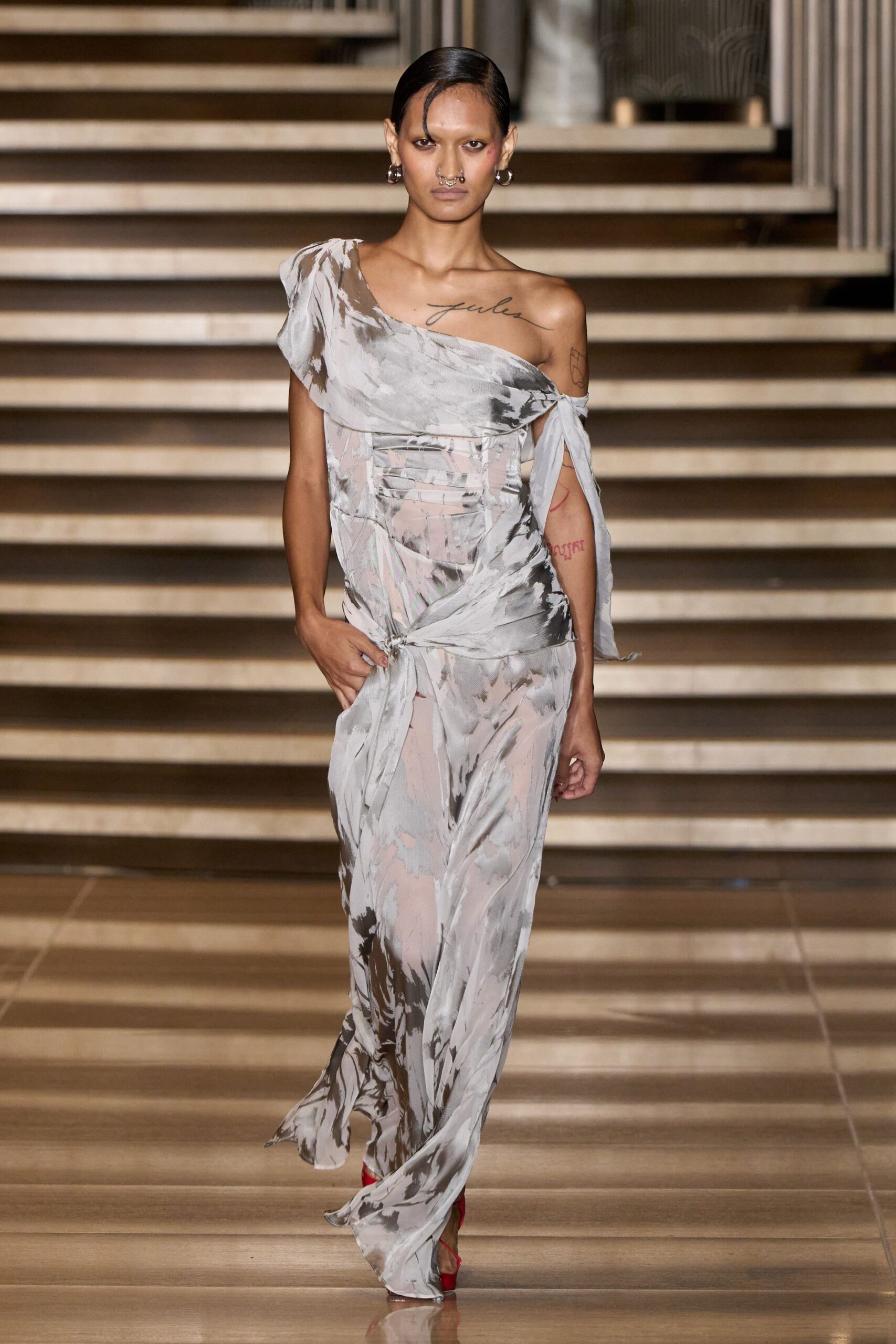 gray silk sleeveless off-shoulder fitted draped gown