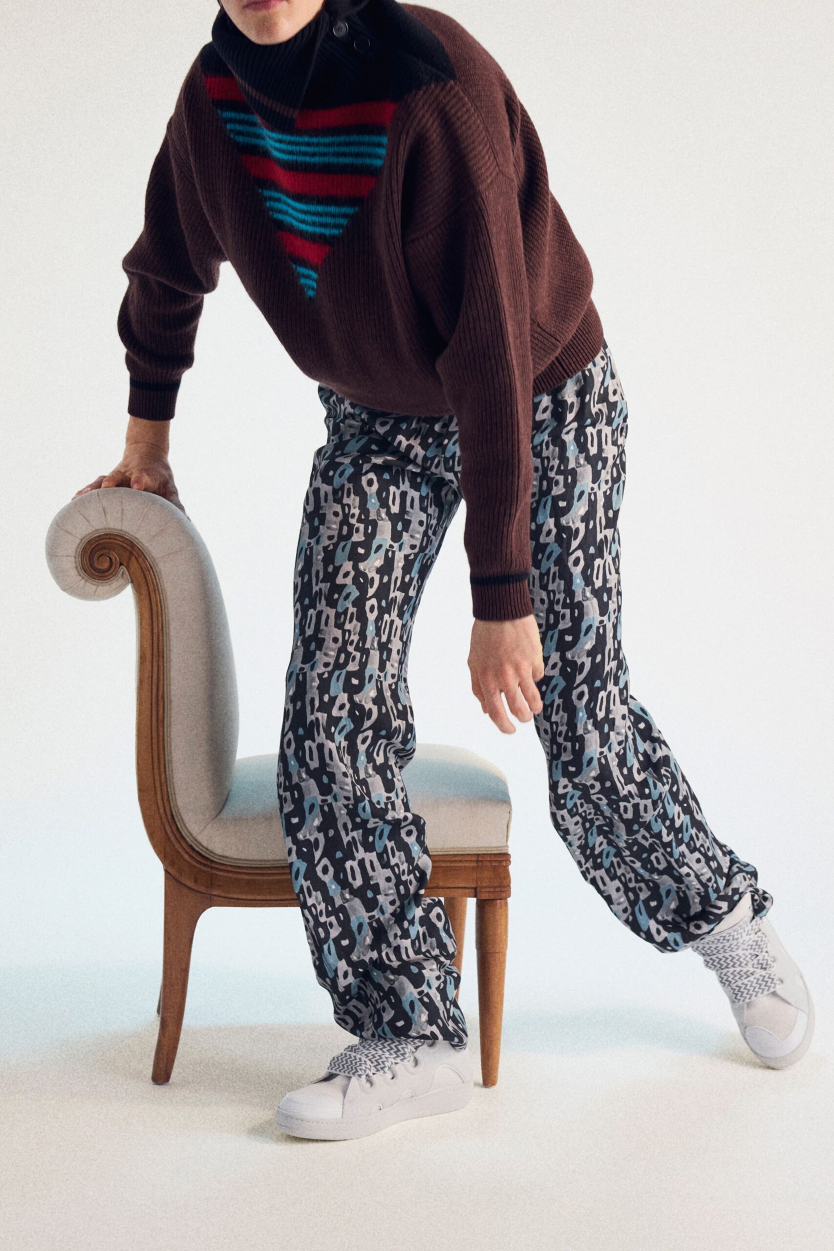 brown relaxed sweater with multi printed pants