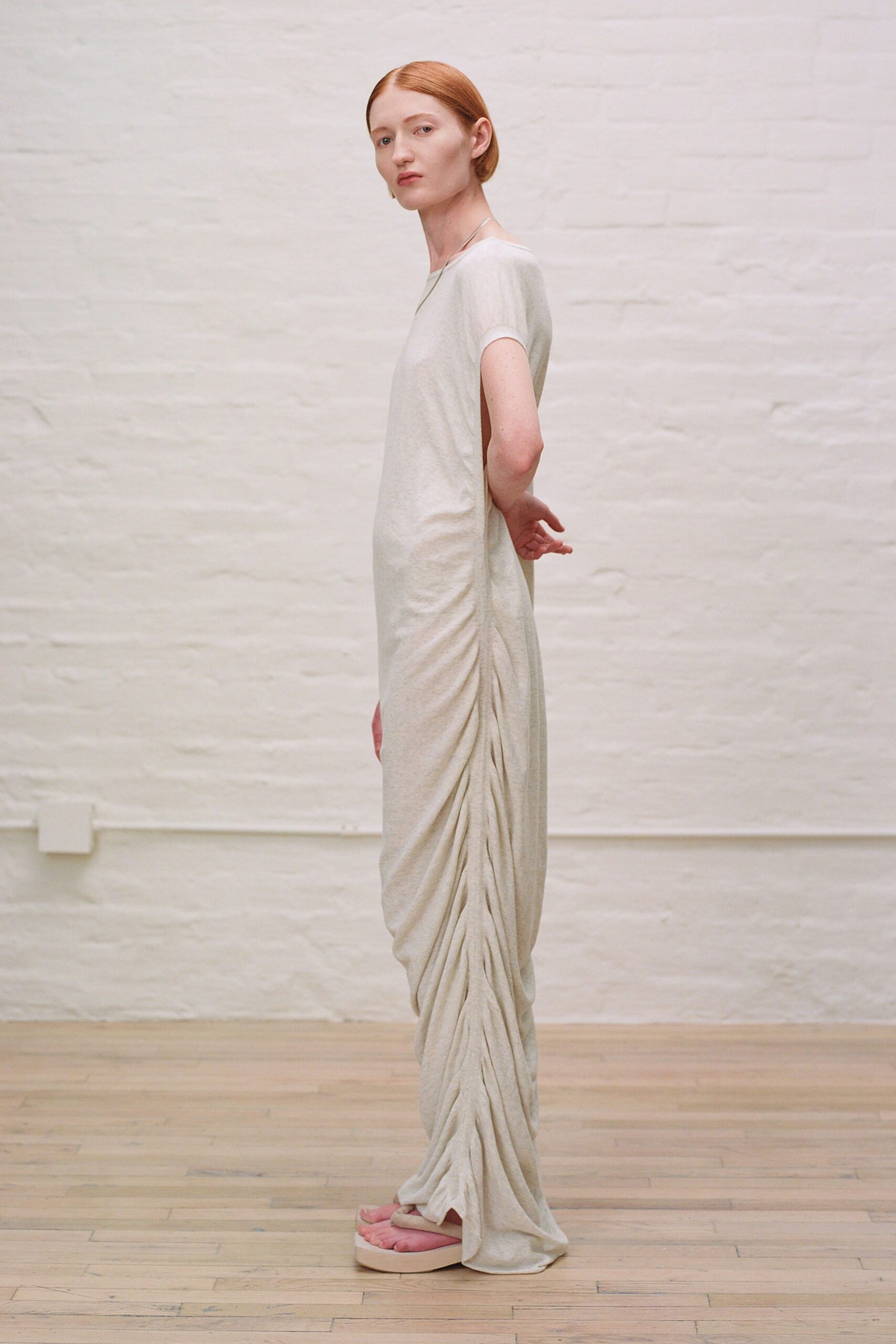 beige ruched maxi dress with pink shoes