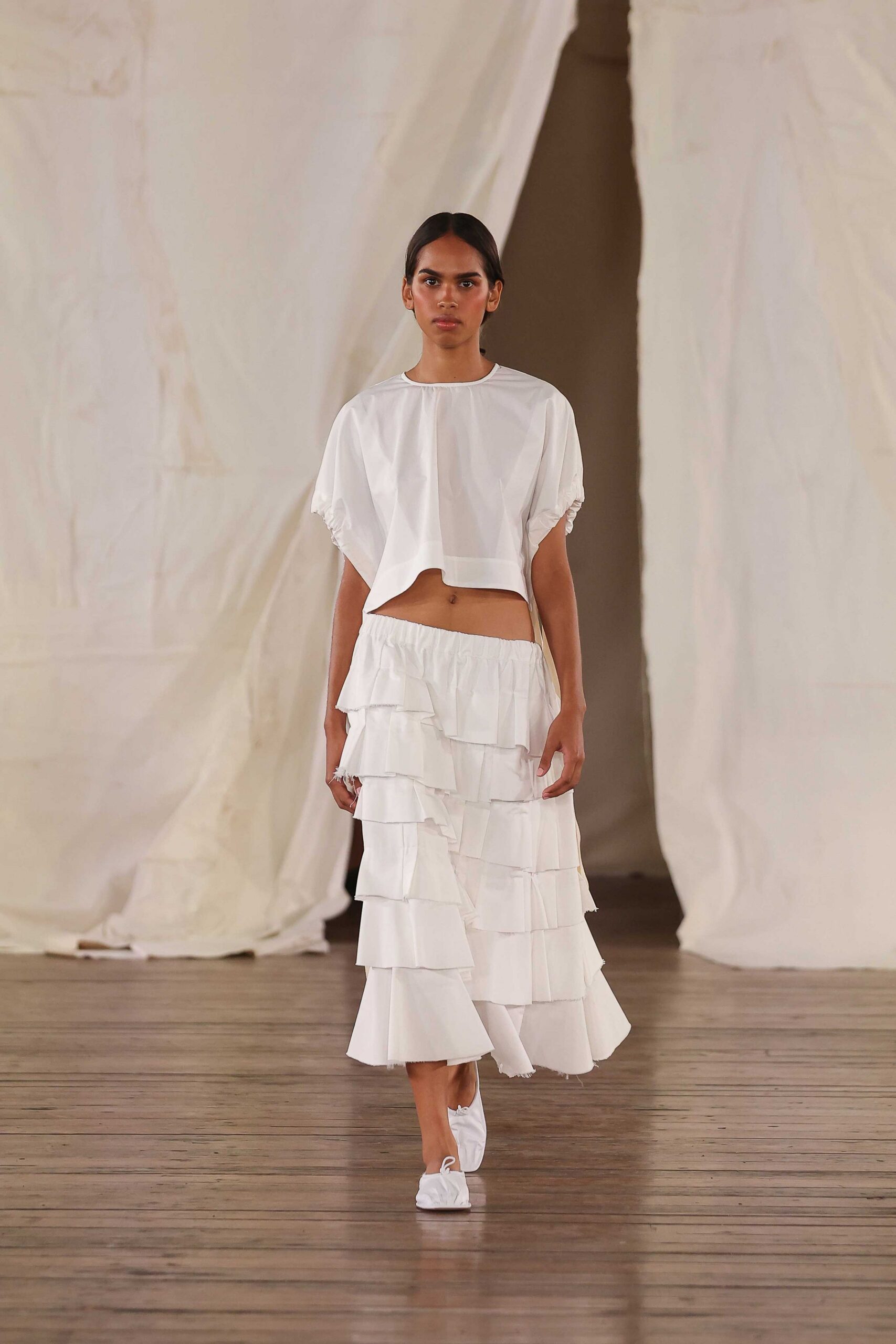 white cropped top and tiered skirt