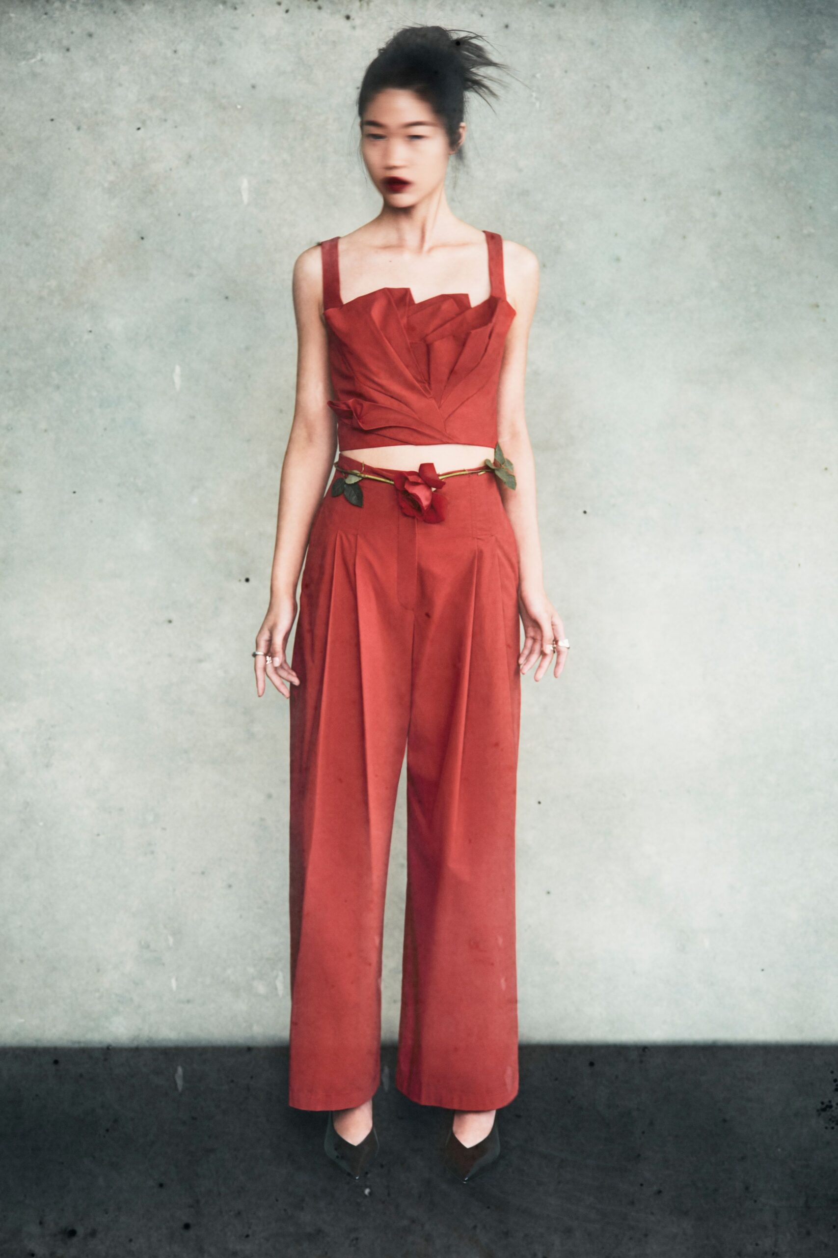 red cotton sleeveless collared fitted pleated top