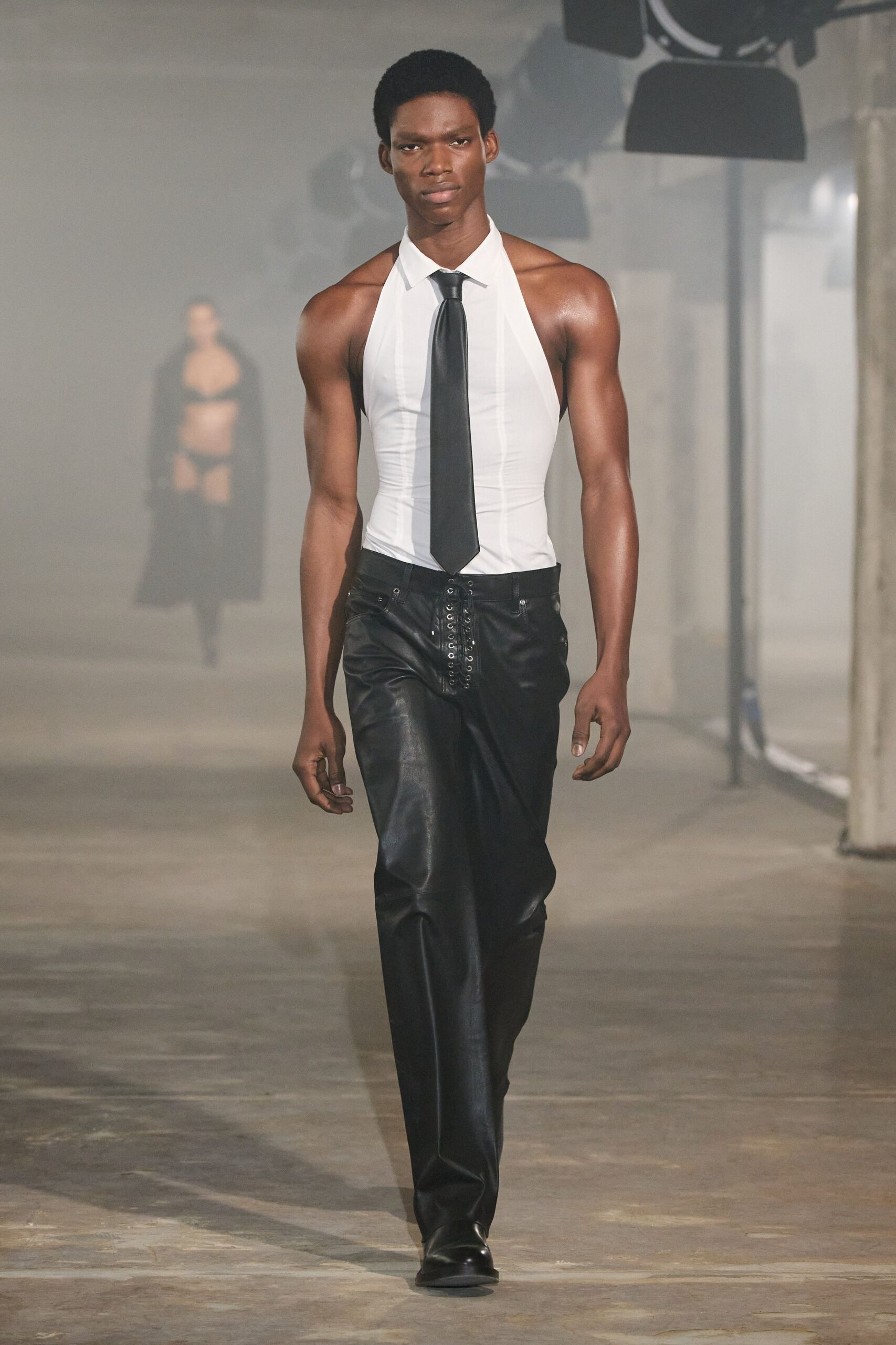 fitted white halter top and black leather pants