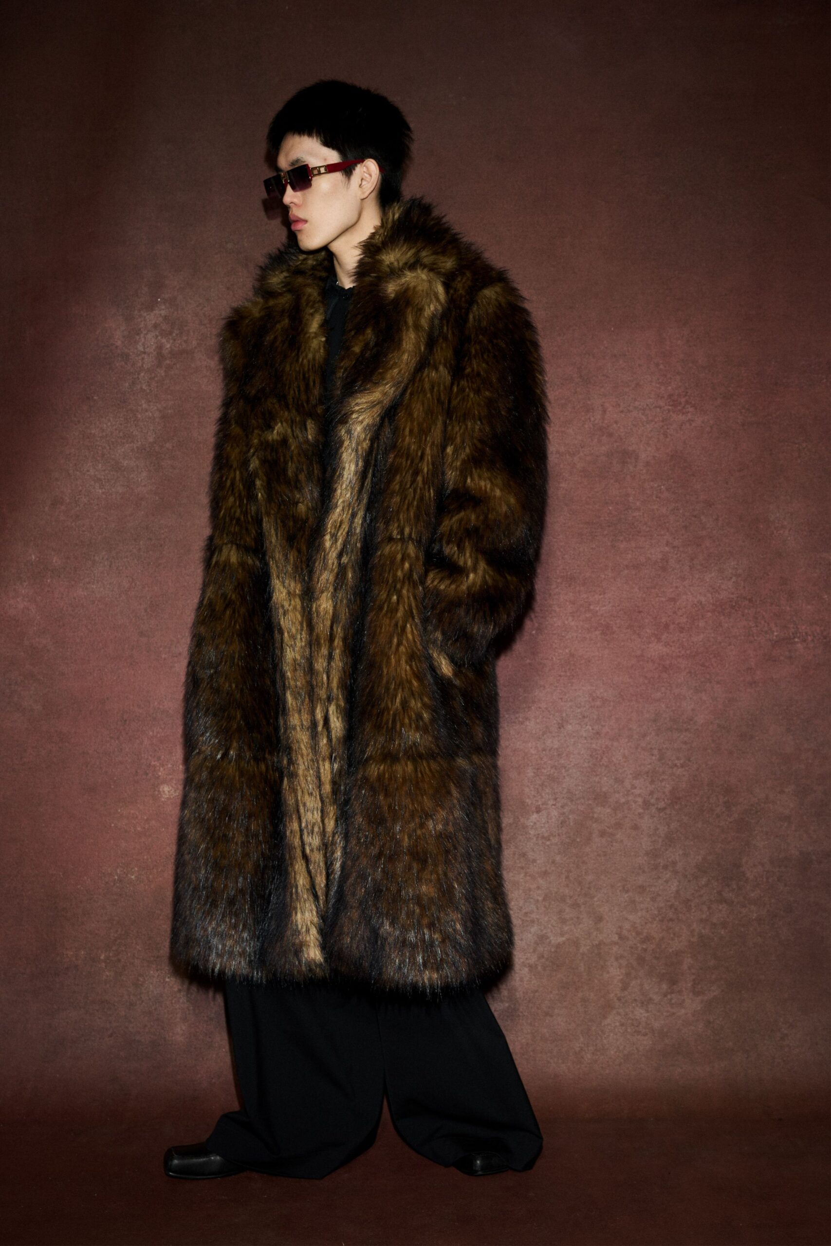 brown fur coat with black pants
