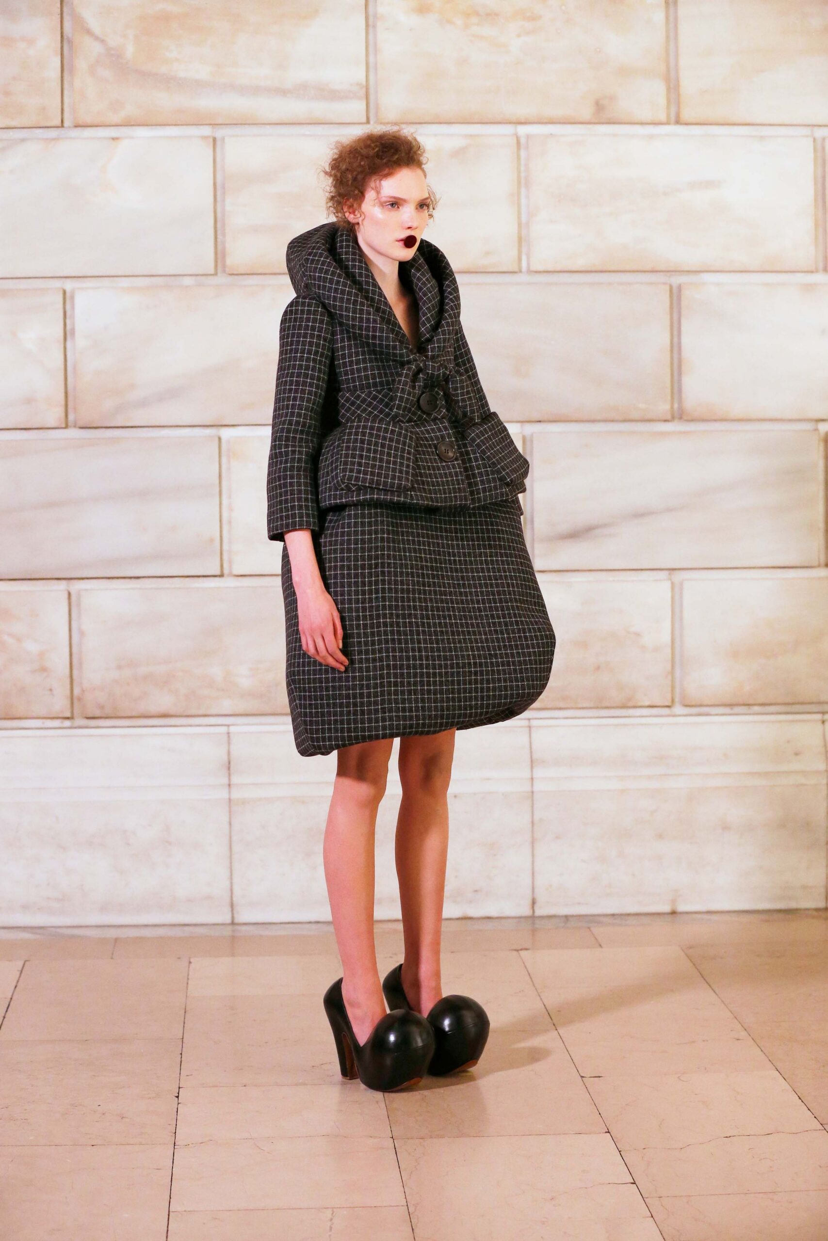 black wool long-sleeve hooded structured buttoned pleated coat