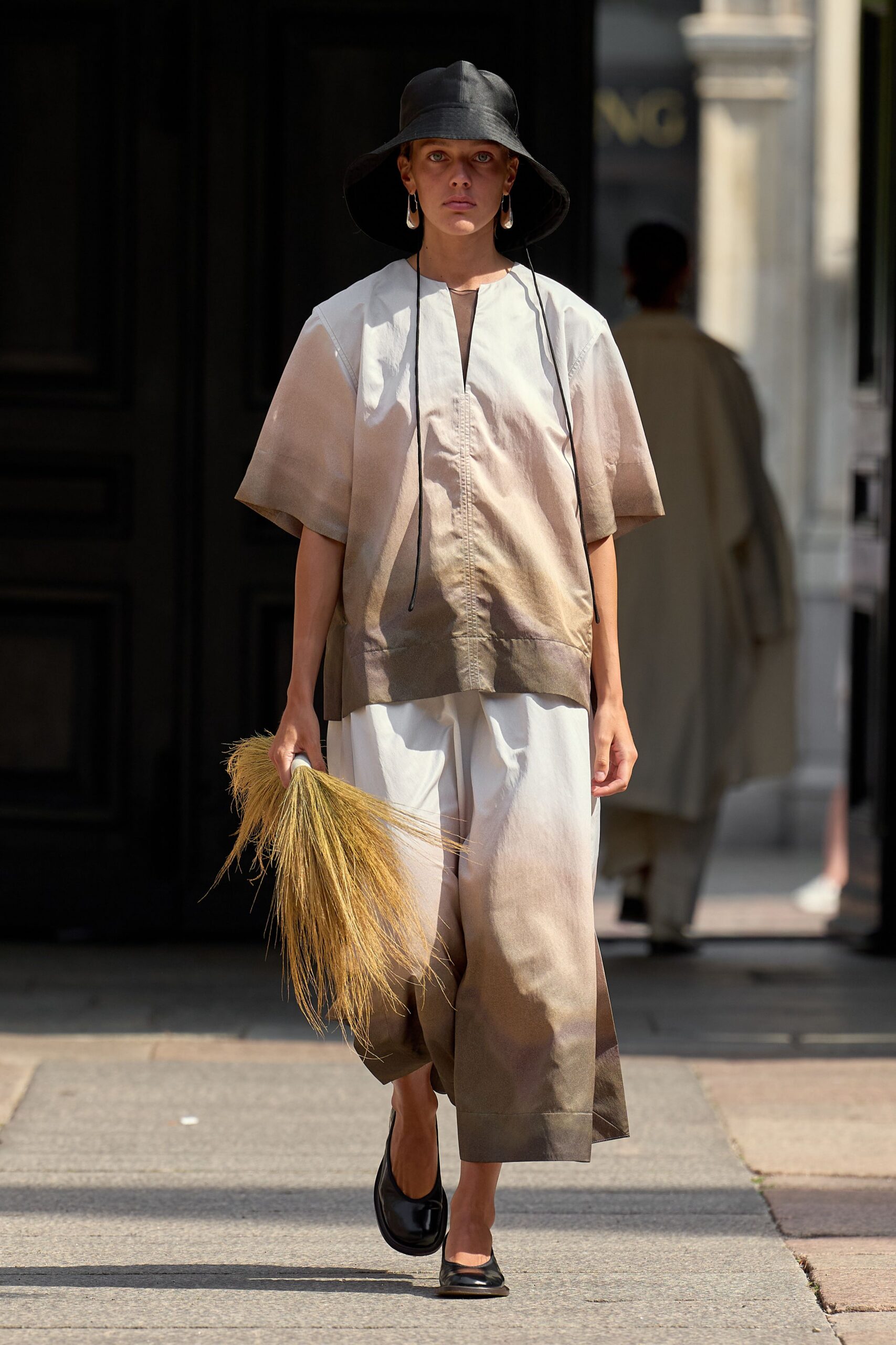 beige and brown relaxed top and pants