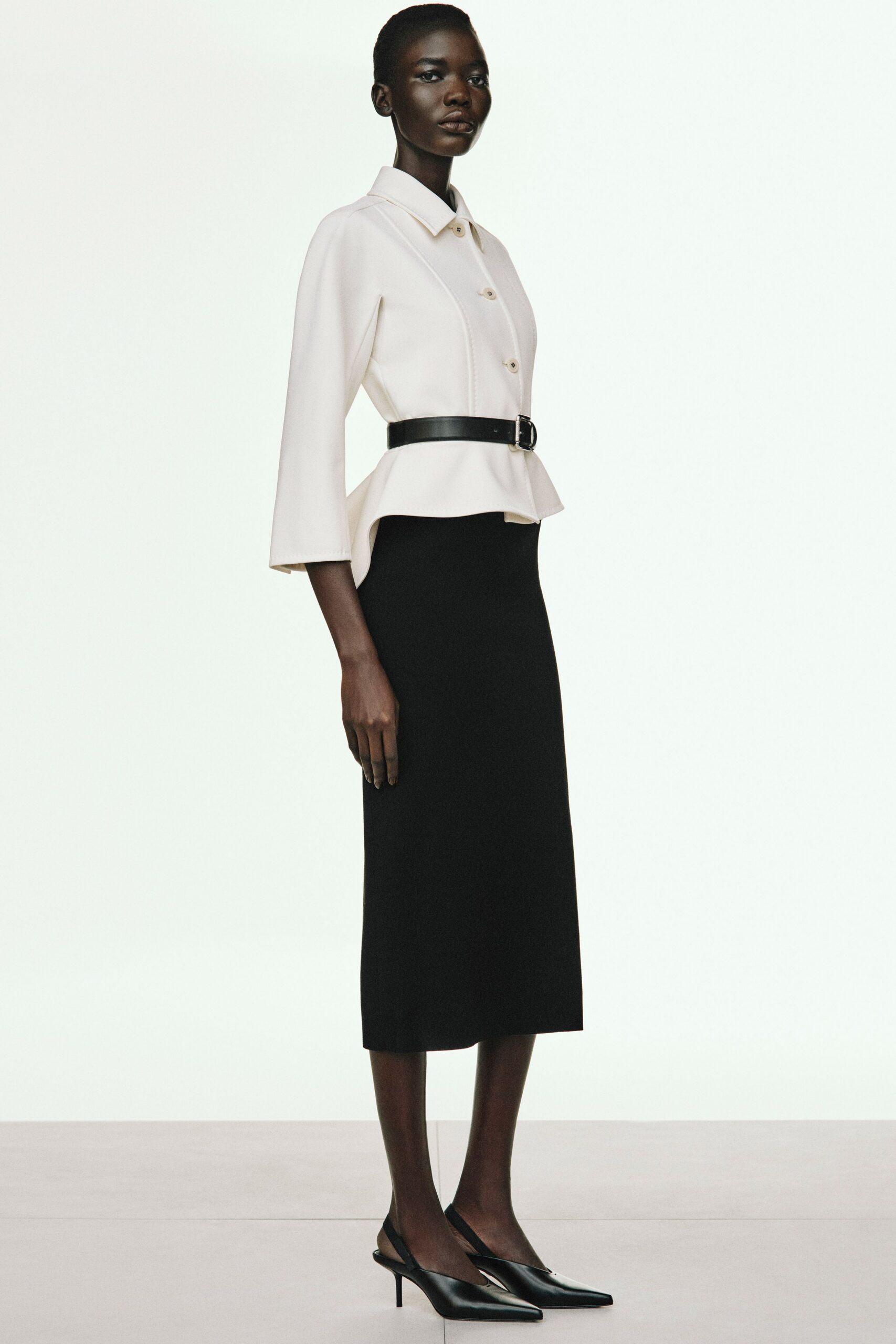 white cotton long-sleeve collared fitted buttoned flared blazer