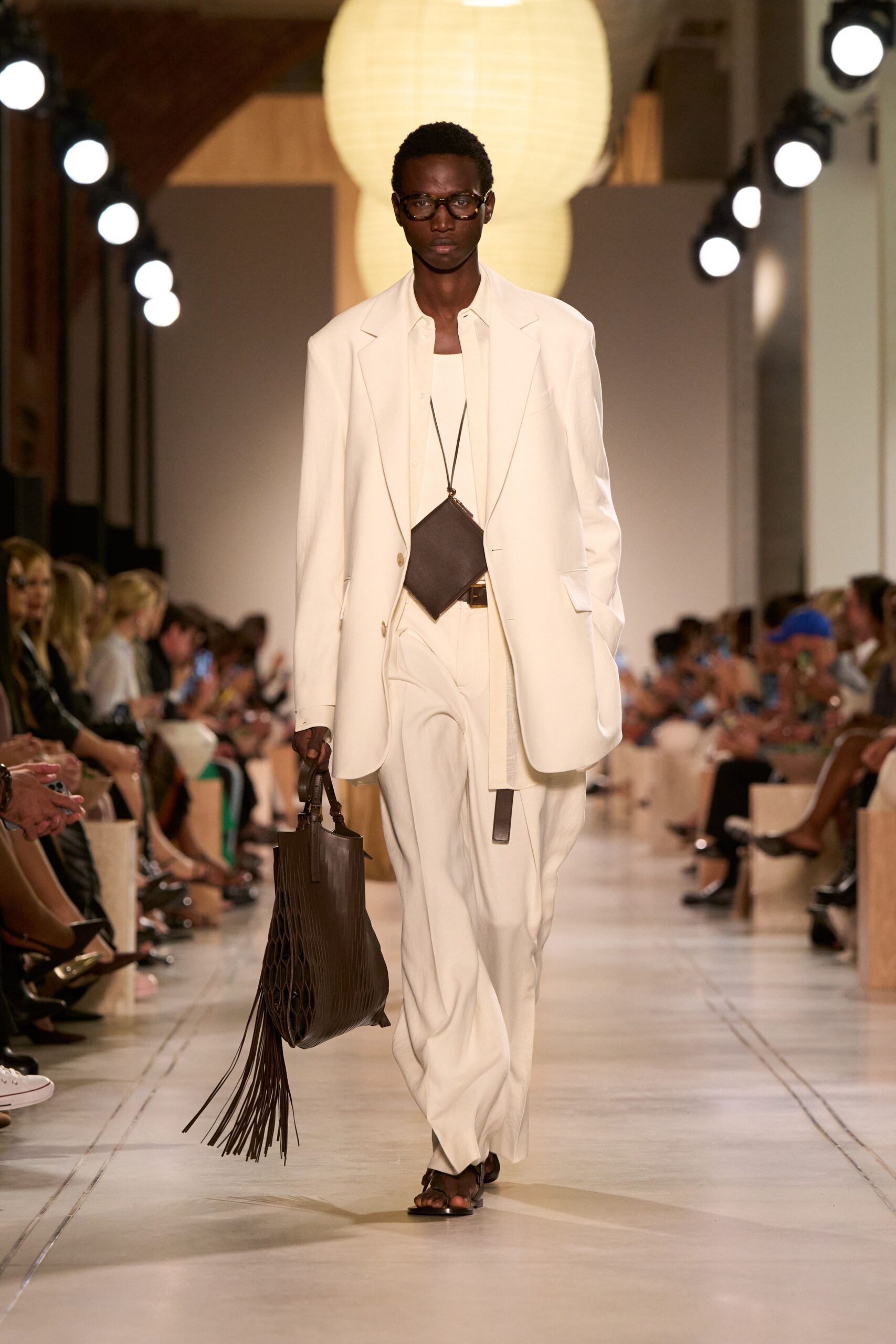 white tailored suit with brown accessories