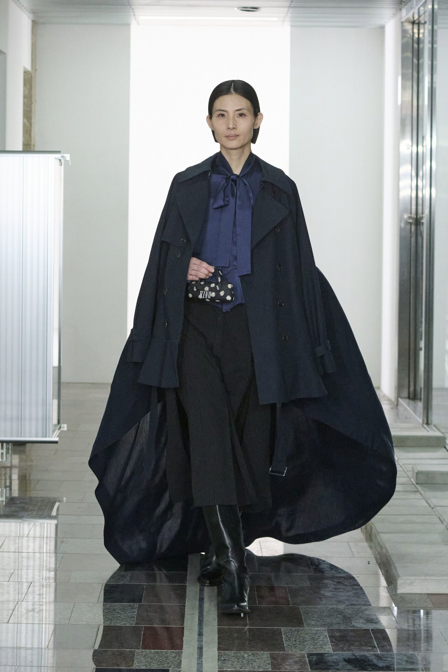 navy cape with blue blouse