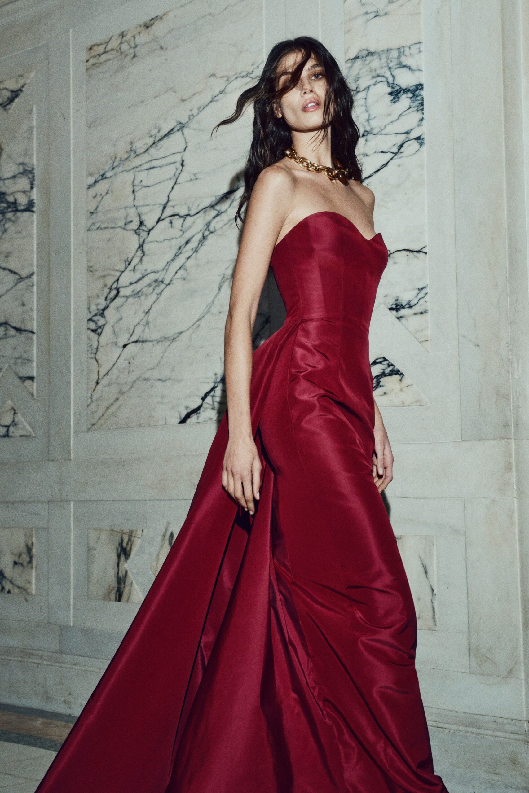 red silk strapless gown