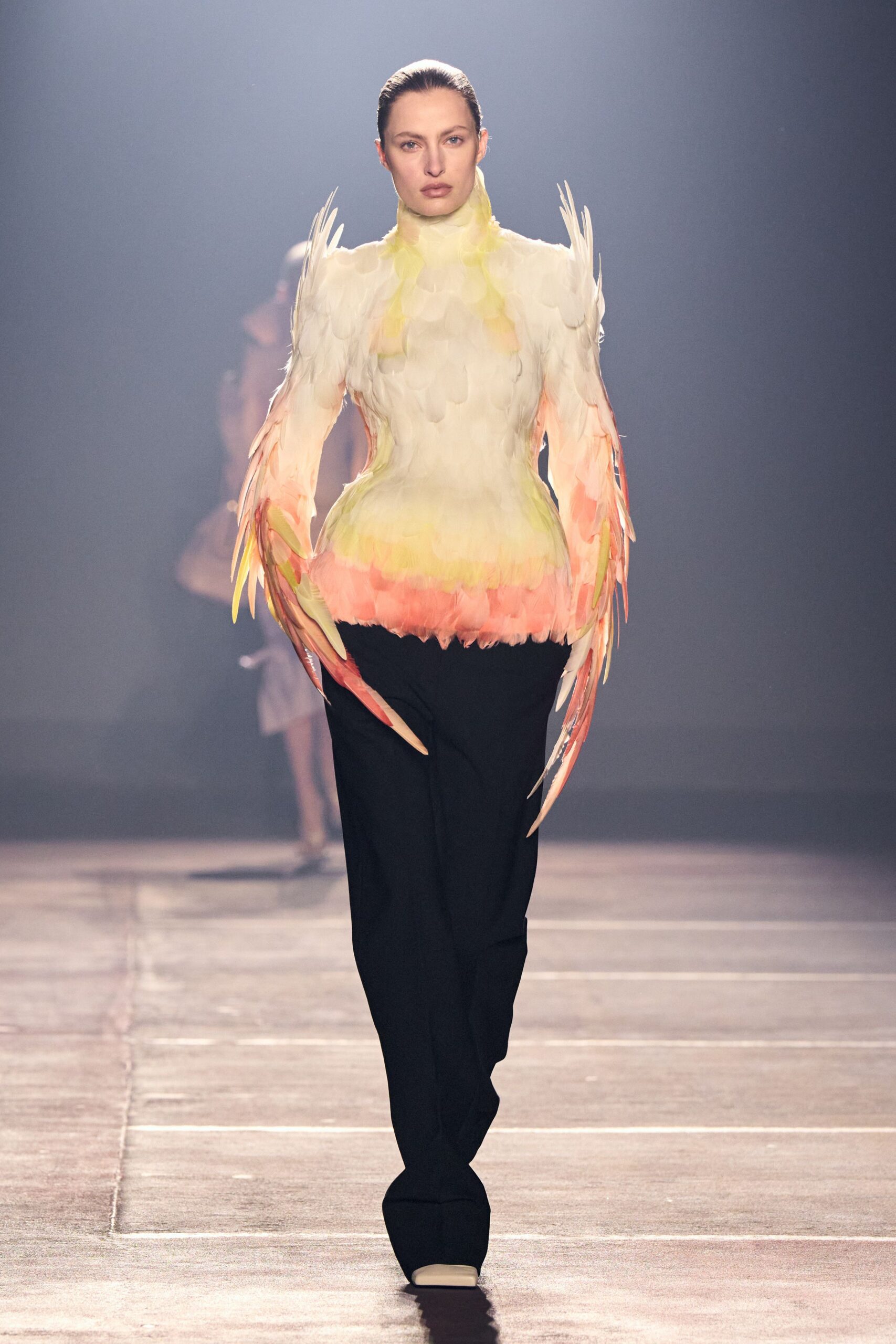 fitted ruffled top with tailored pants