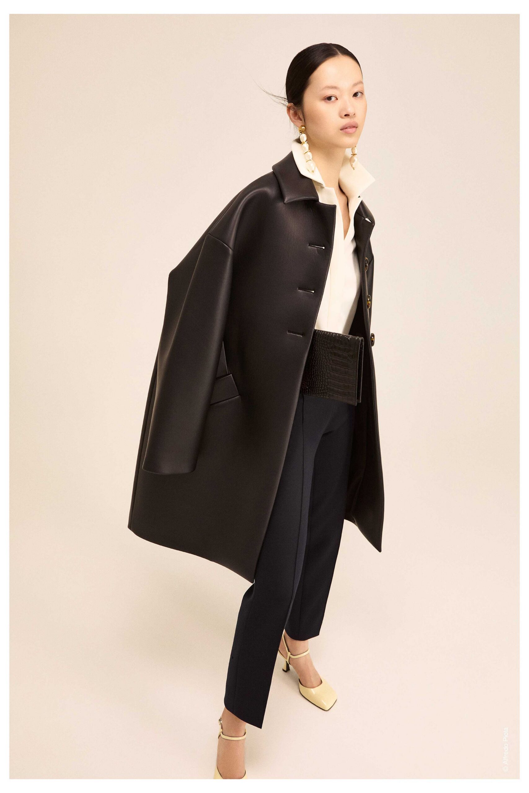 black vinyl long-sleeve collared oversized buttoned coat