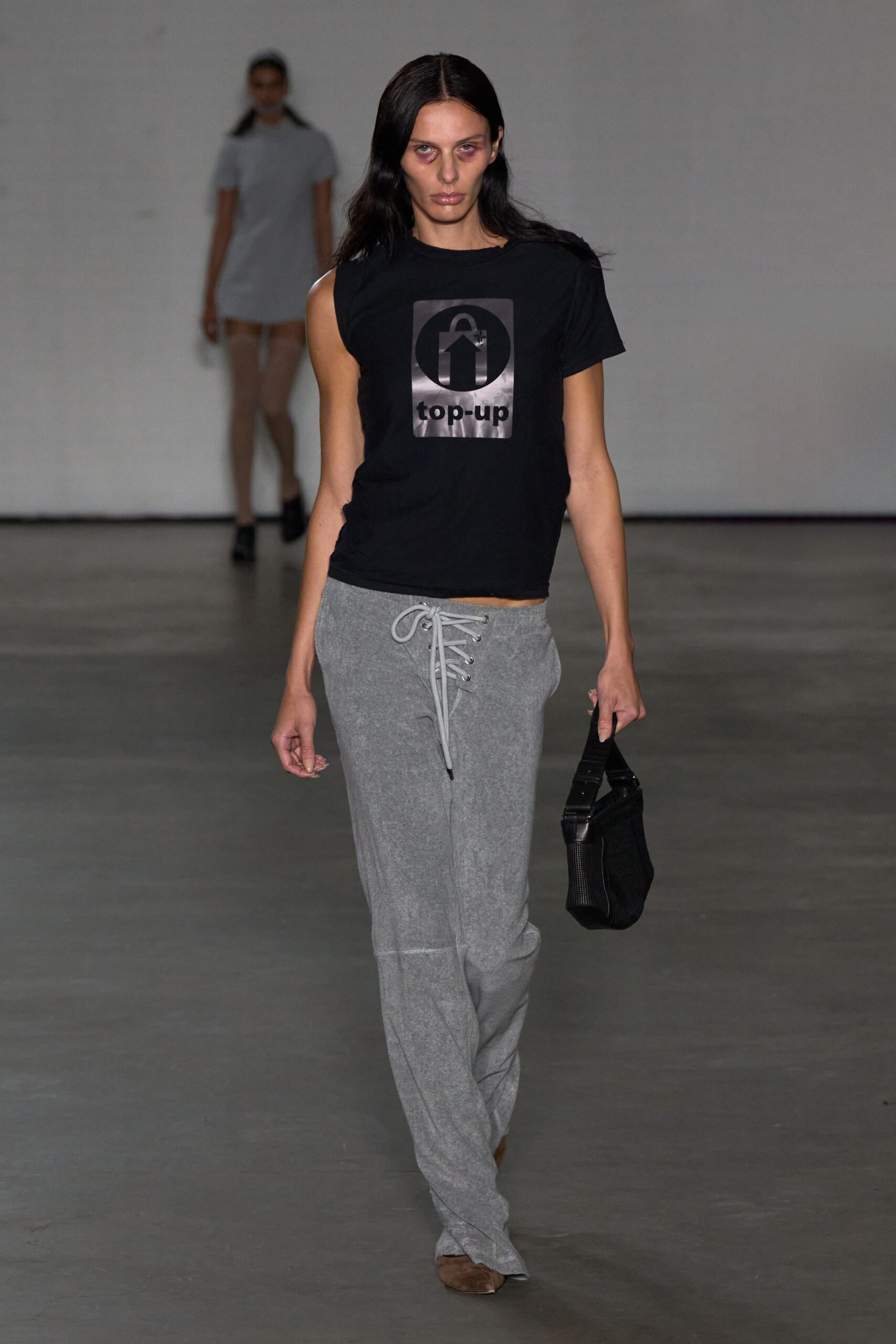 black t-shirt gray pants