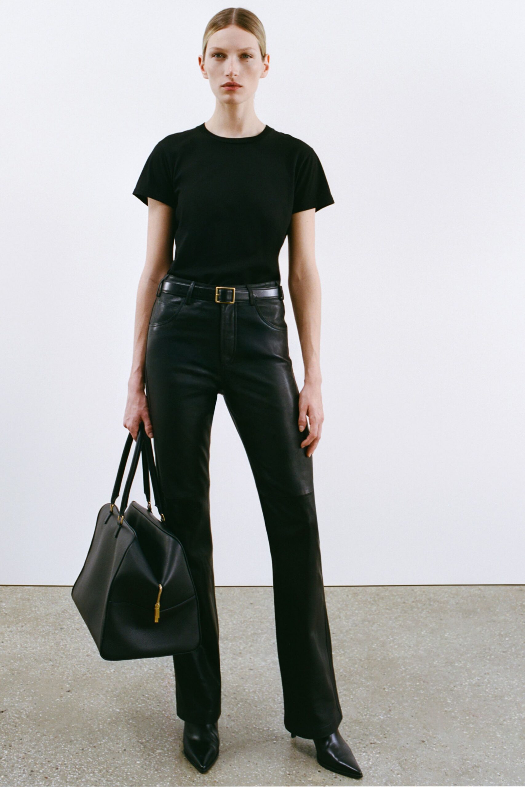 black fitted t-shirt and leather pants