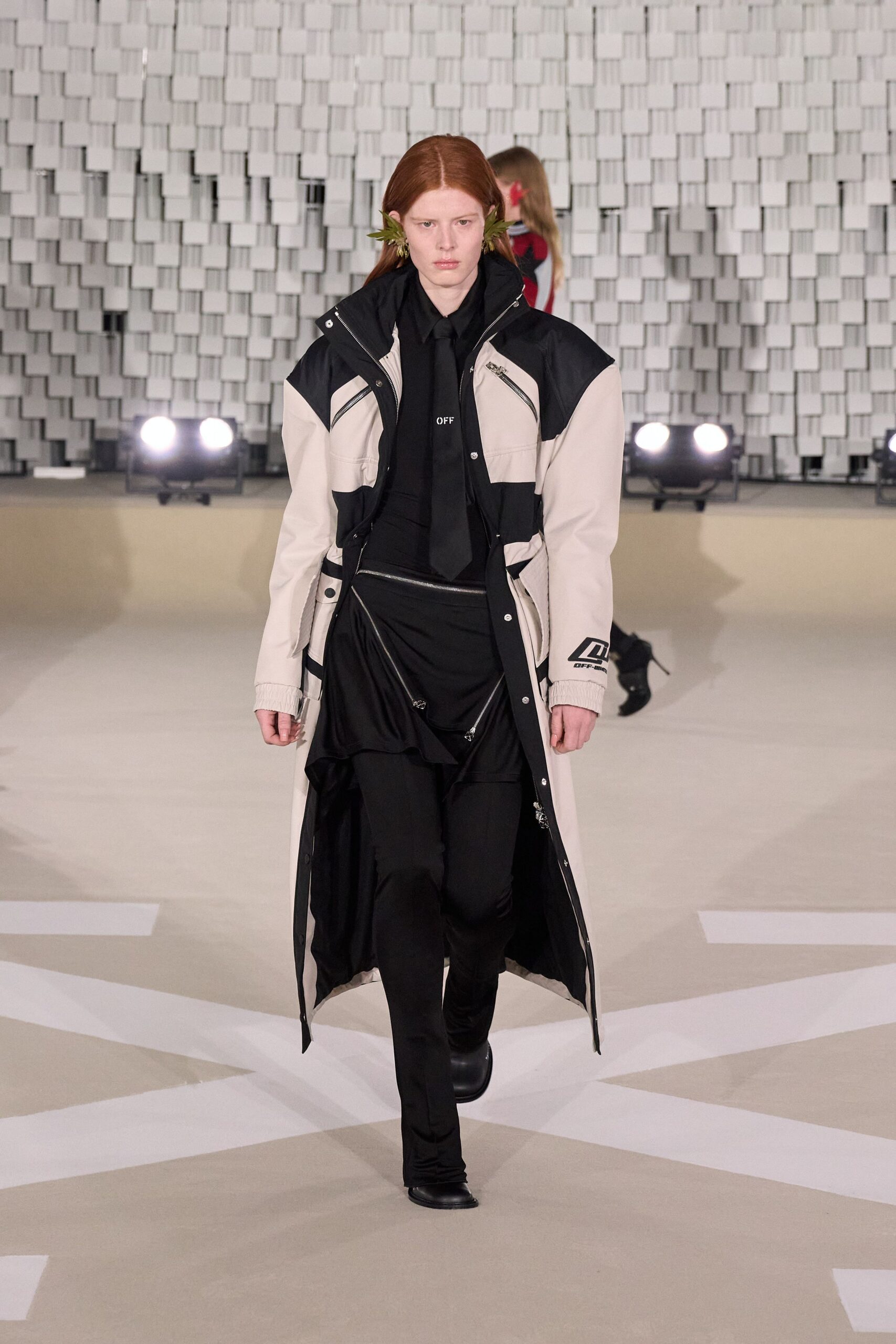 black cotton long-sleeve collared relaxed zippered buttoned coat