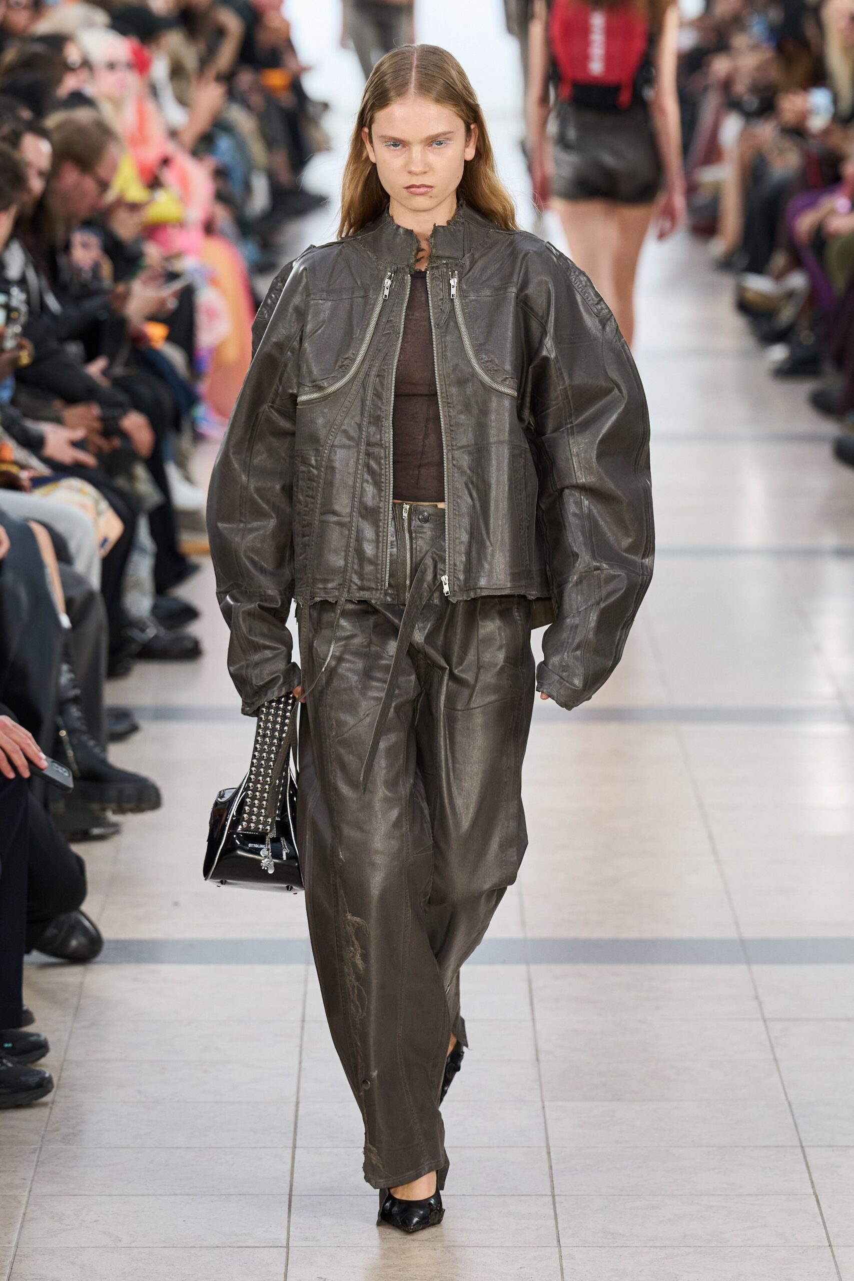 brown leather oversized jacket and relaxed pants