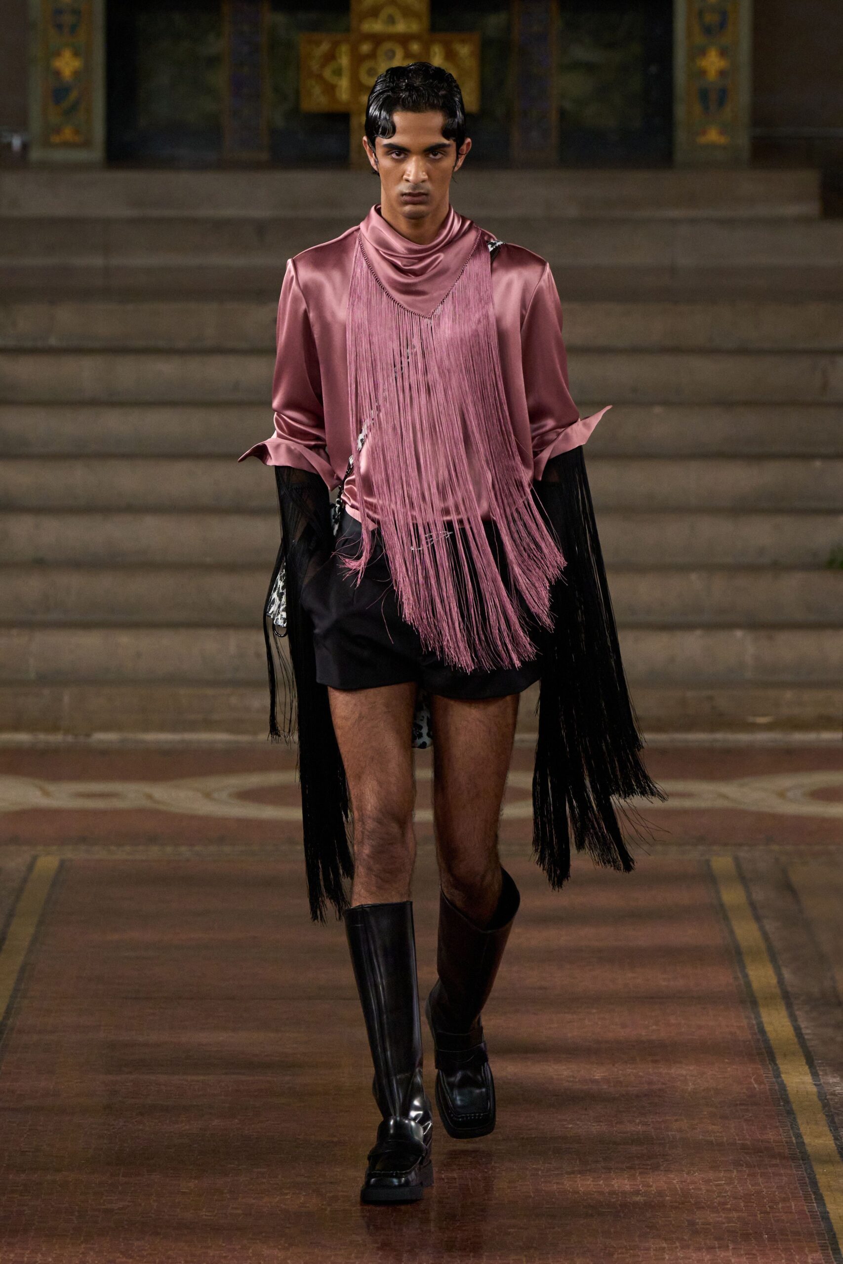 pink silk fringed shirt with black shorts