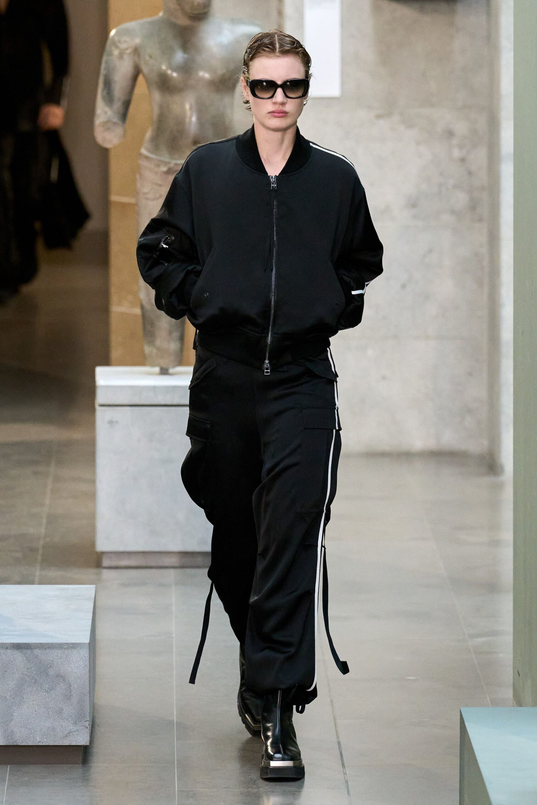 black fitted jacket and relaxed pants