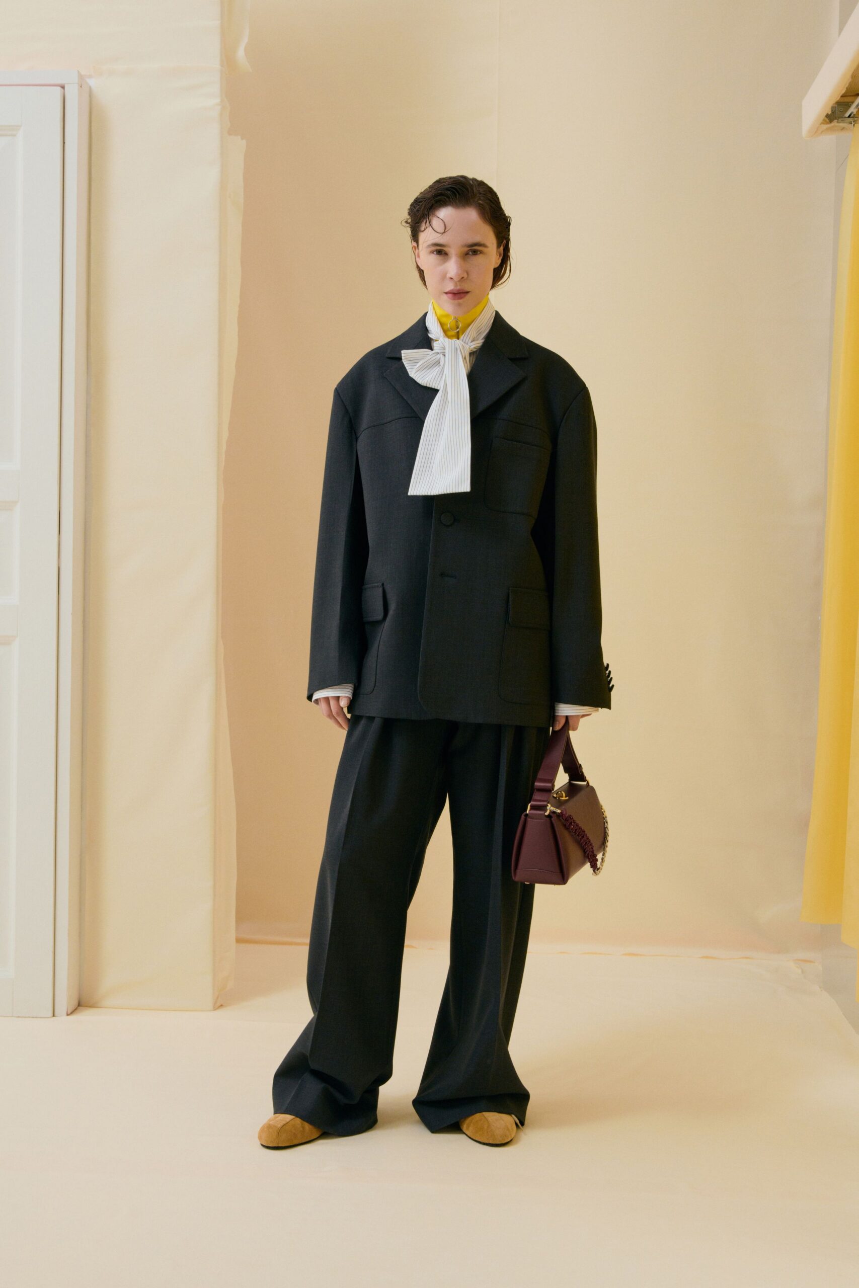 black wool long-sleeve collared oversized buttoned jacket