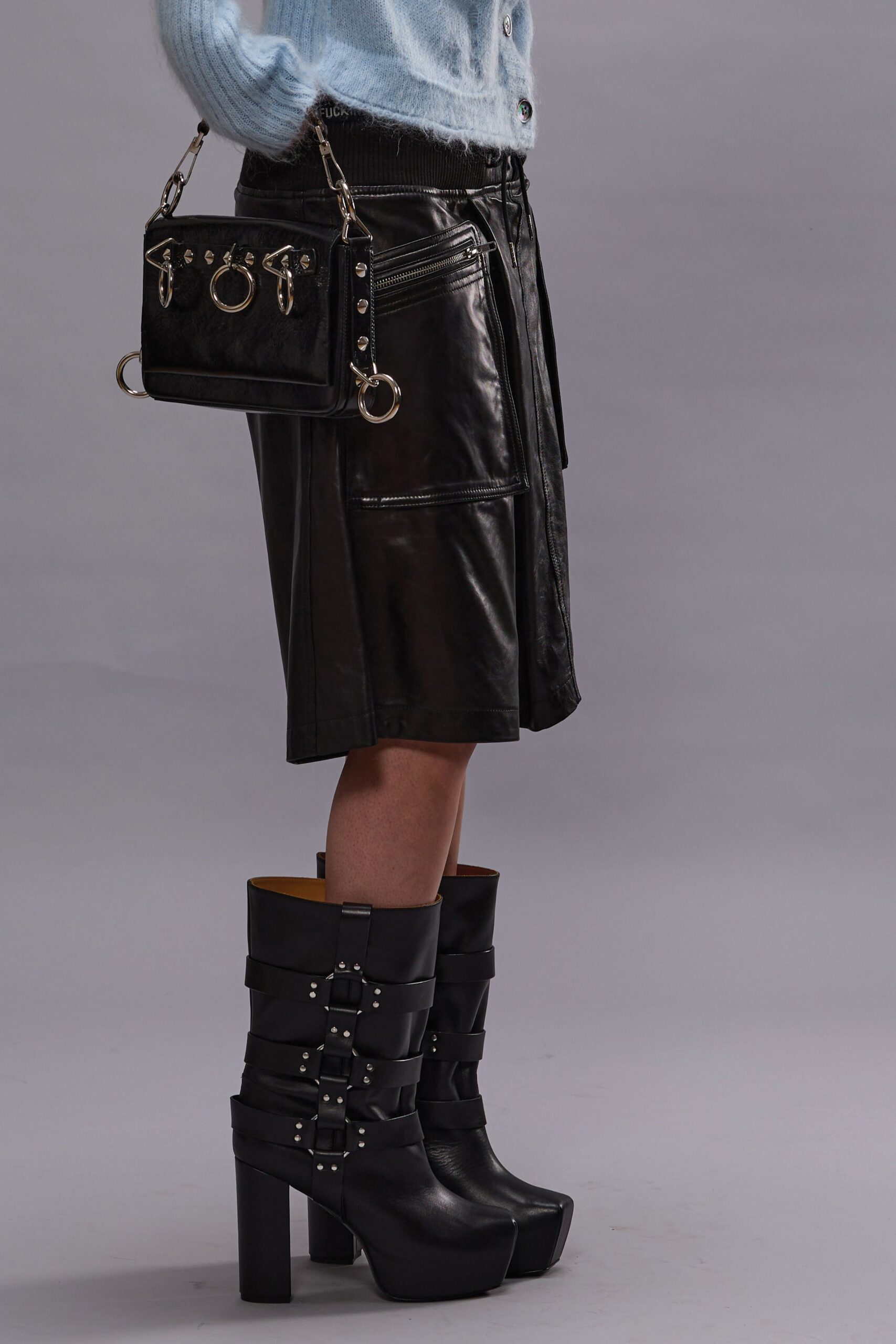 blue wool sweater black leather skirt
