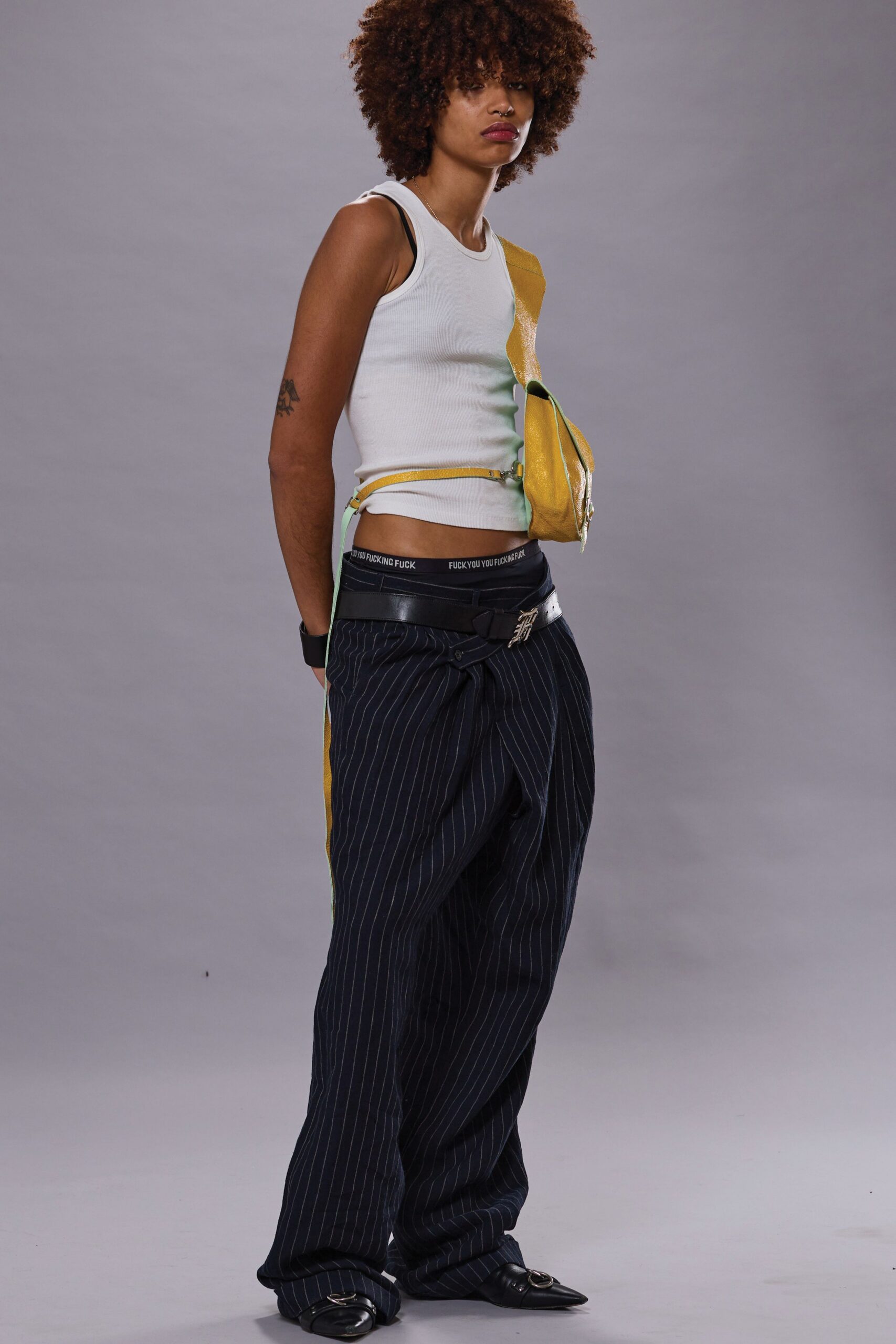 white tank-top and blue striped pants