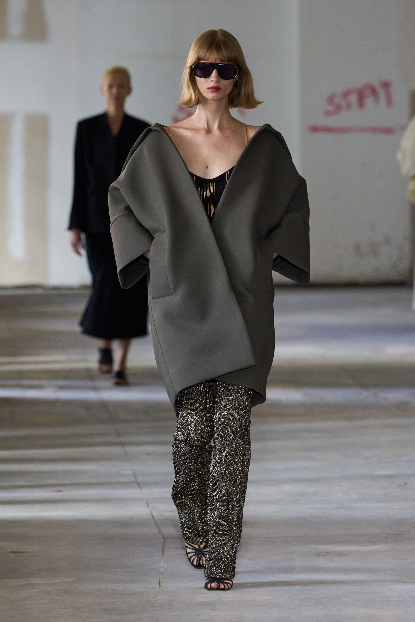 black silk fitted flared shiny pants