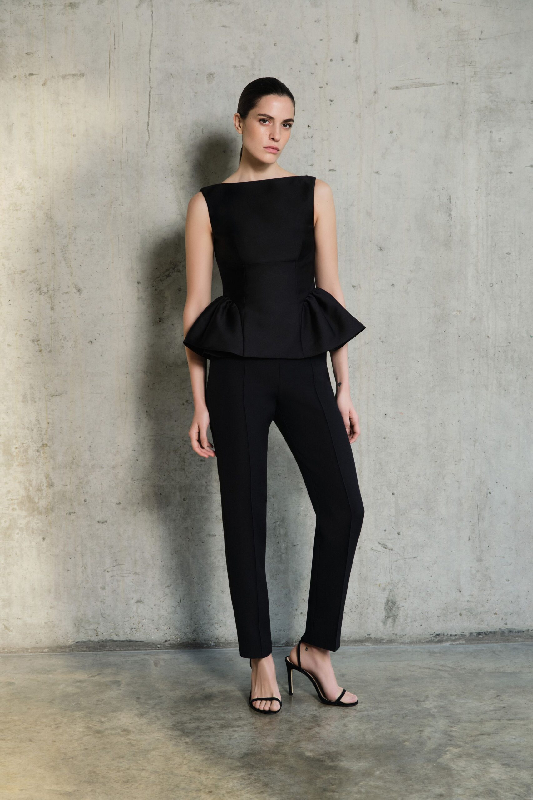 black silk sleeveless high-neck fitted flared top