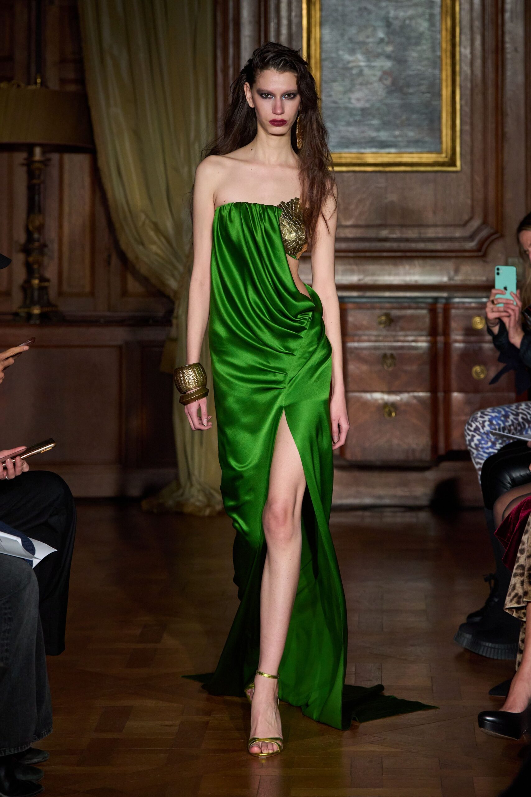 green silk strapless slit fitted draped flowing gown