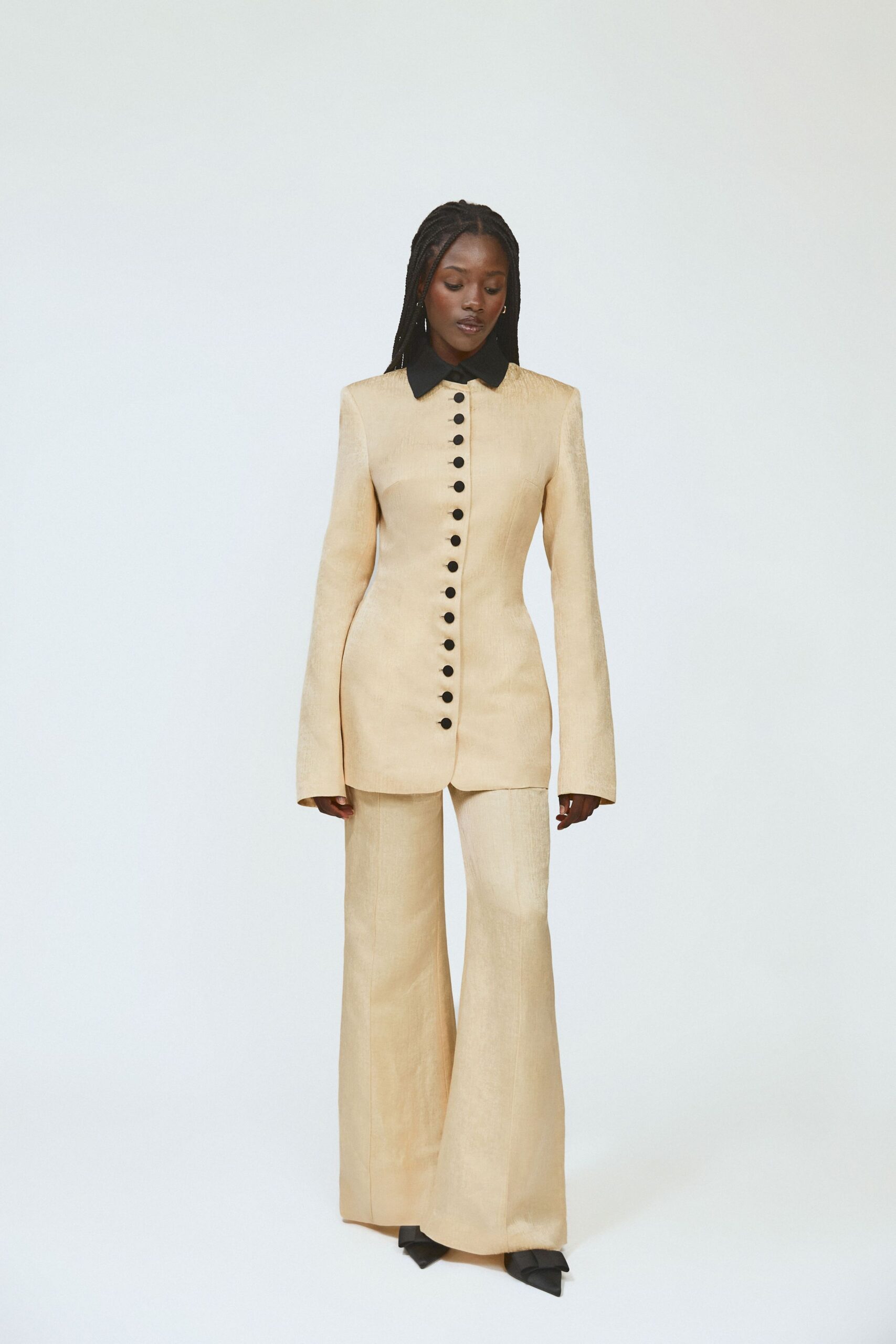 beige silk tailored flared pants