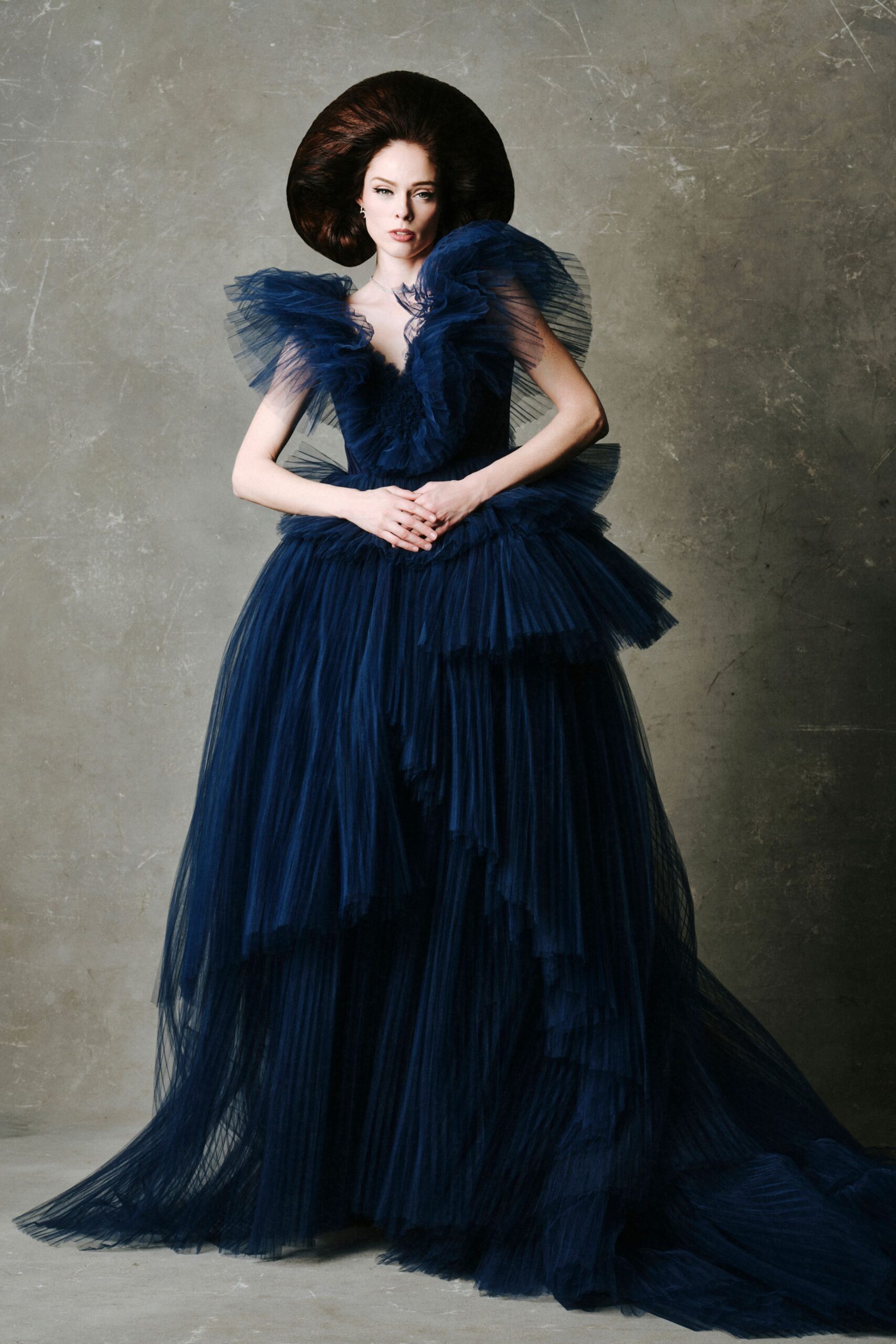 blue tulle ruffled gown with hat