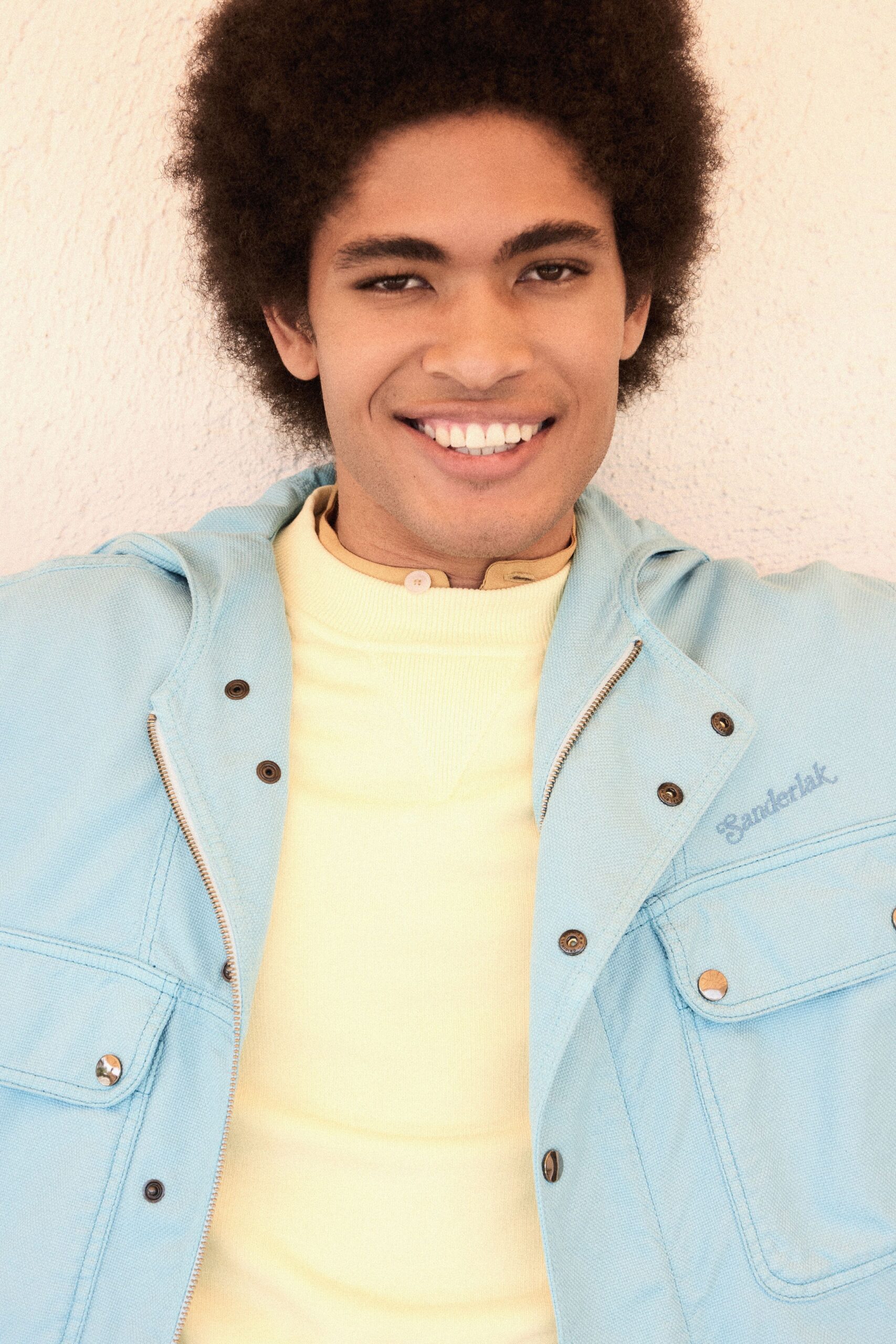 blue relaxed jacket with yellow t-shirt