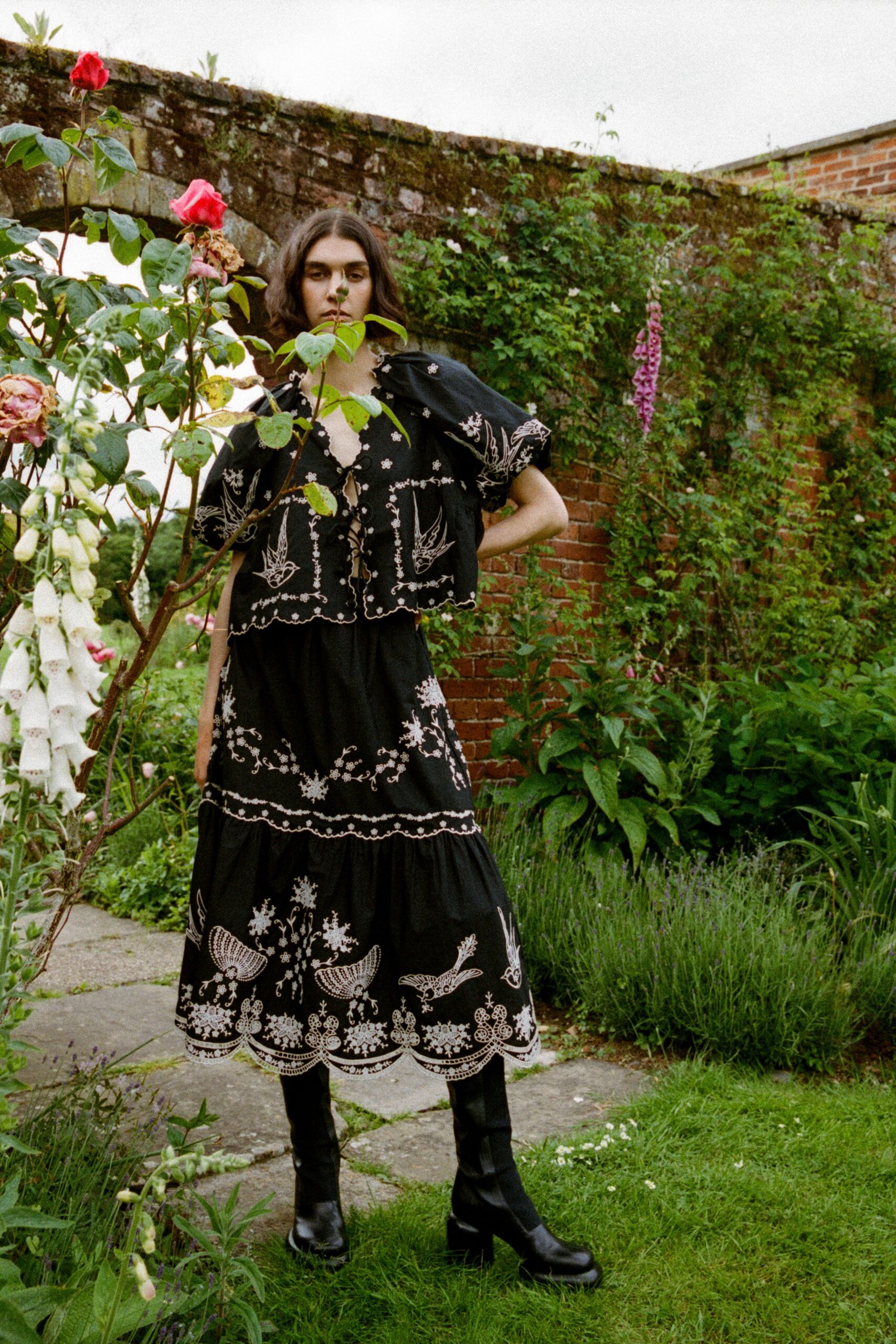 black cotton short-sleeve v-neck fitted embroidered tiered dress