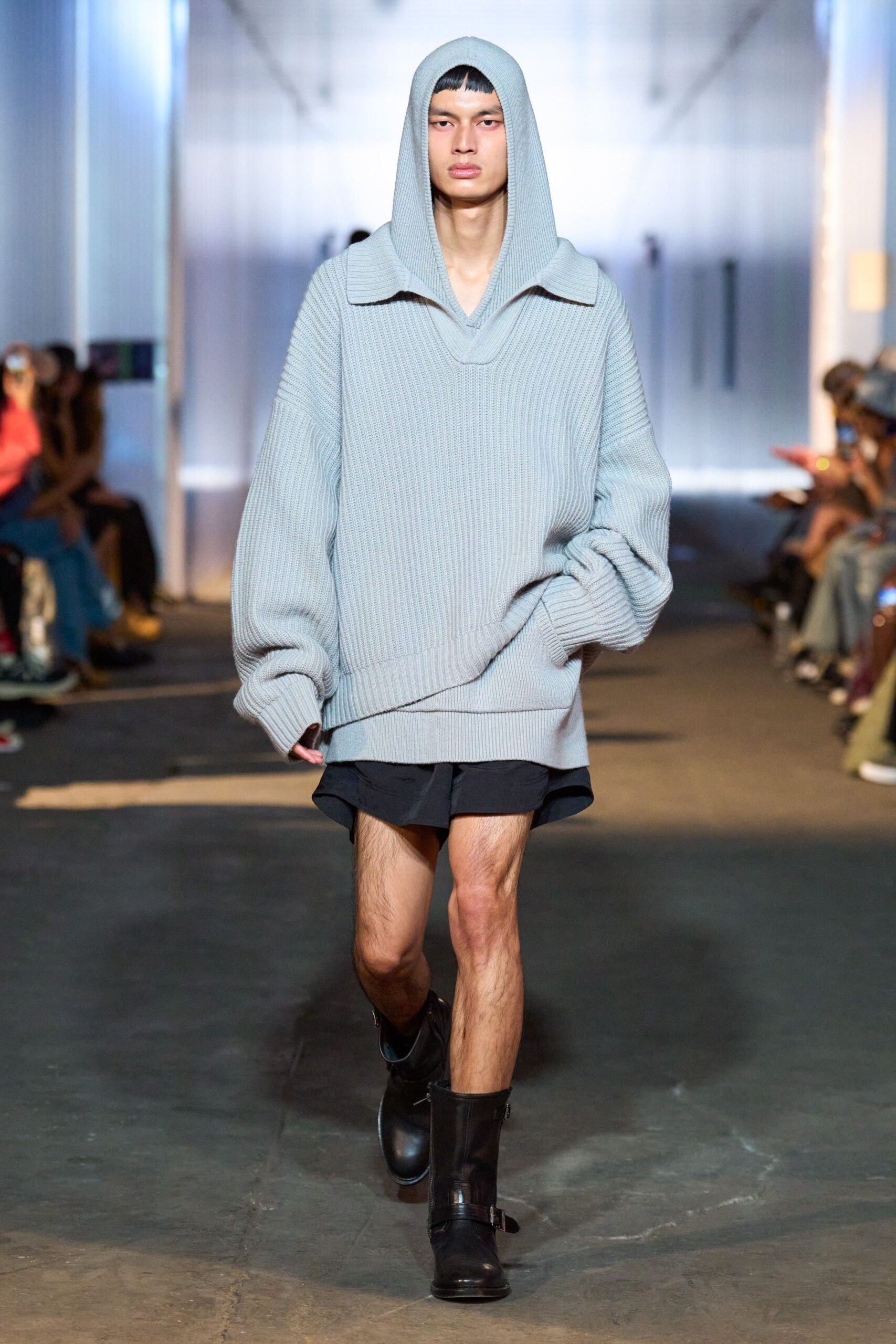 gray oversized hoodie with black shorts