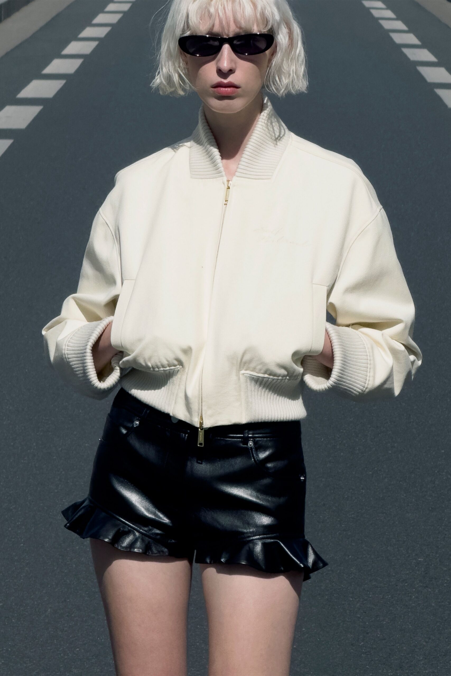 black leather fitted ruffled short shorts