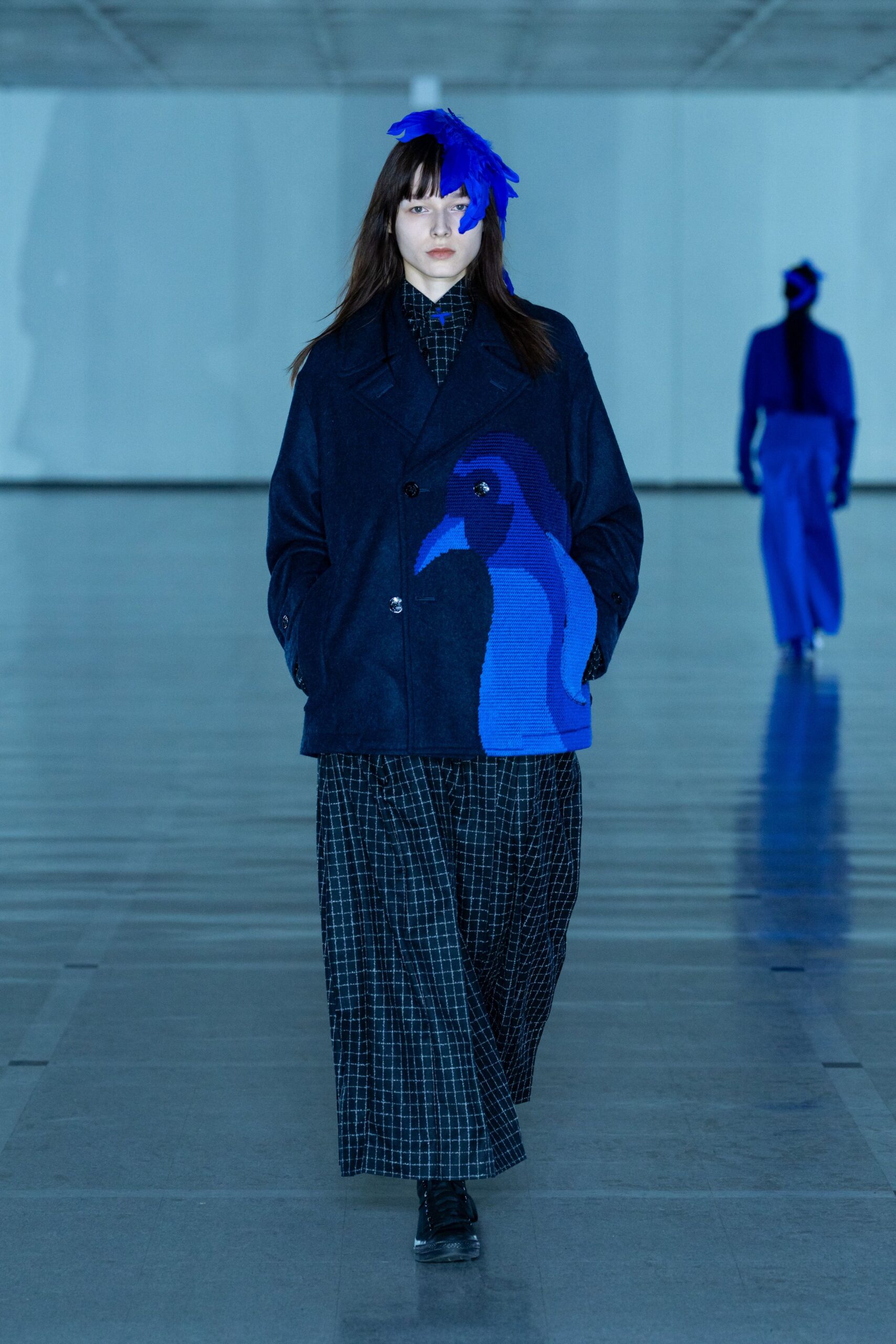 black wool coat with blue embroidery
