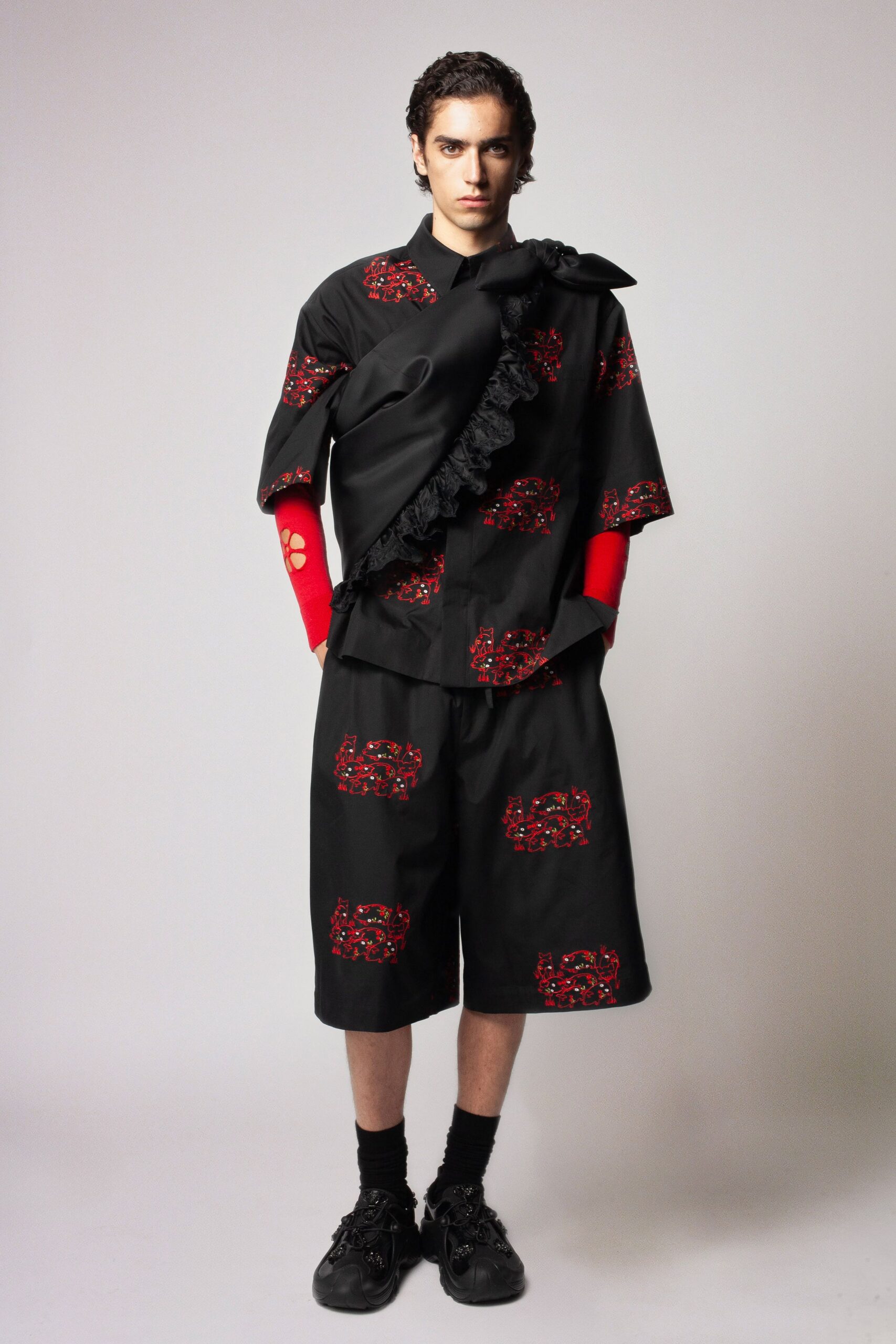 black embroidered shirt and shorts