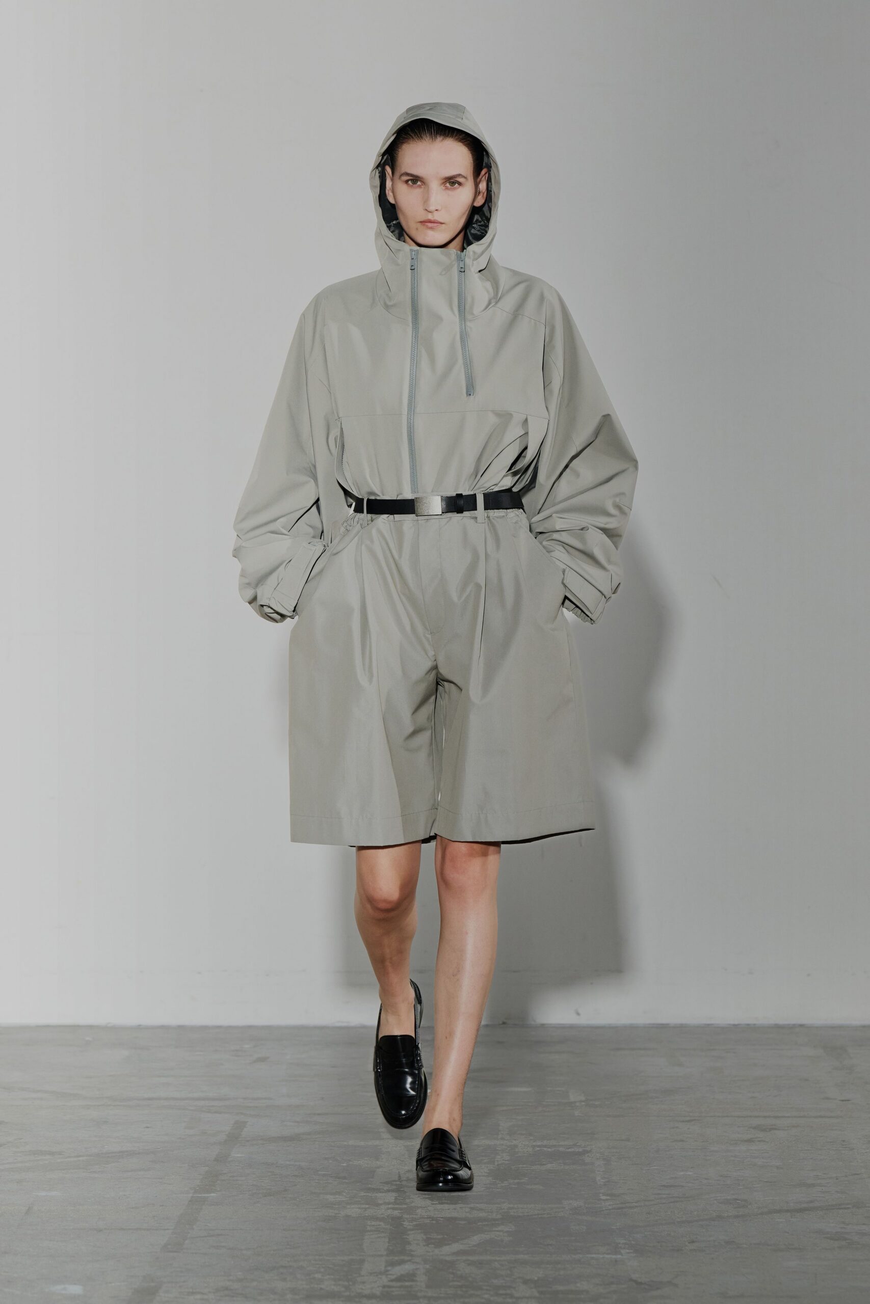 gray vinyl hooded short-sleeve relaxed zippered pockets jumpsuit