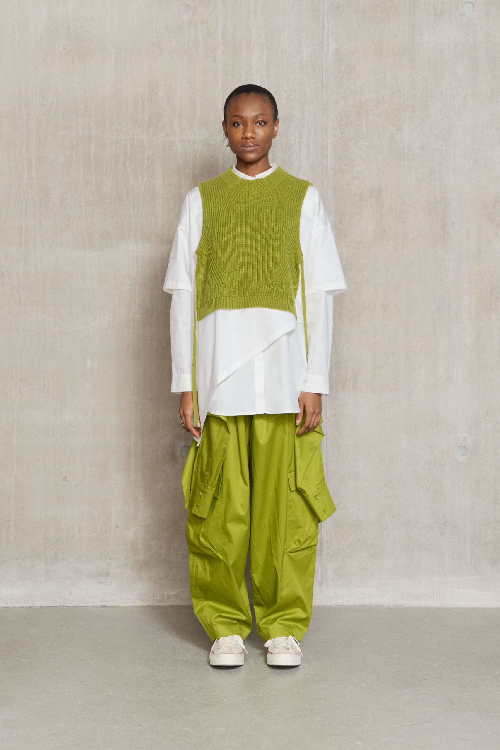 green knit sleeveless fitted vest
