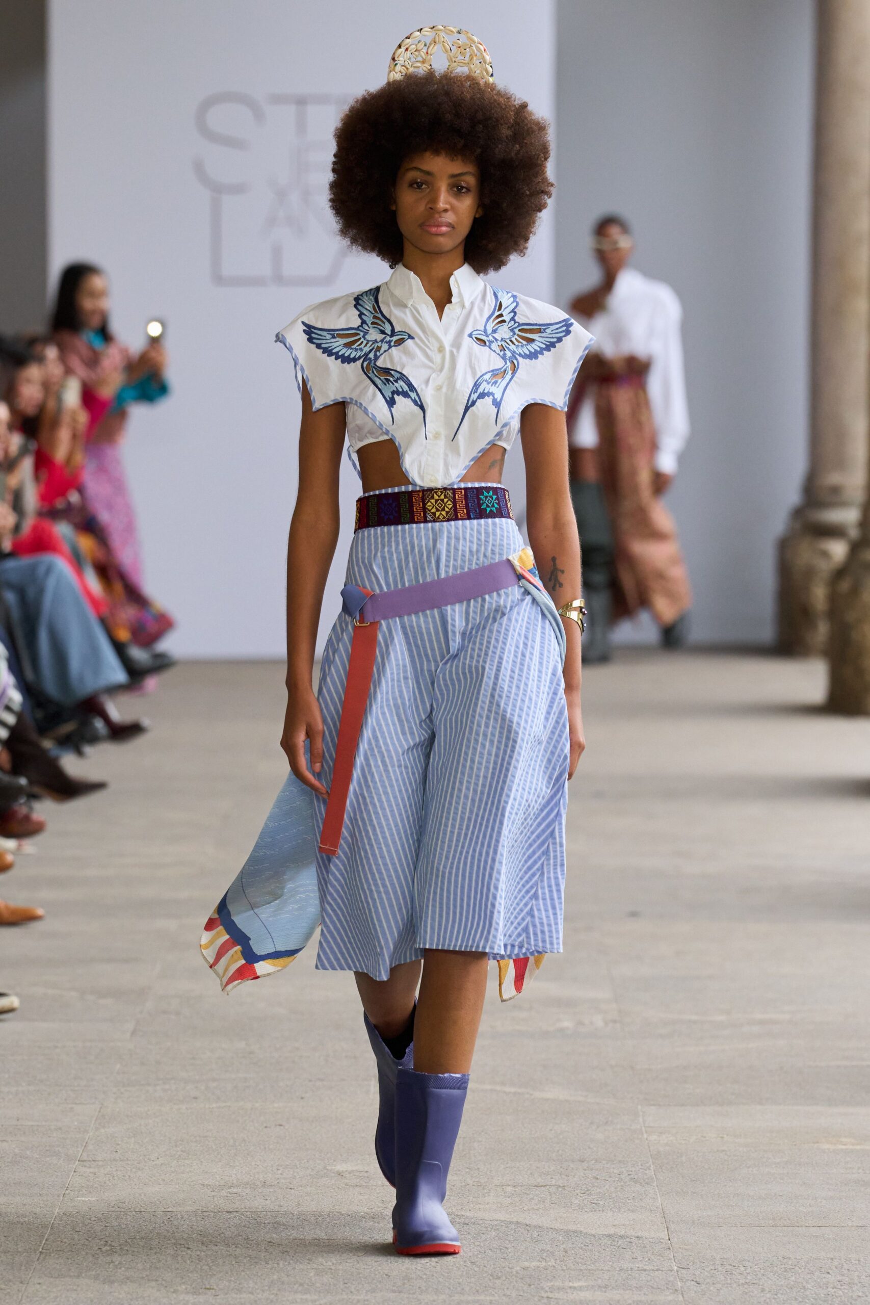 embroidered white shirt with striped skirt