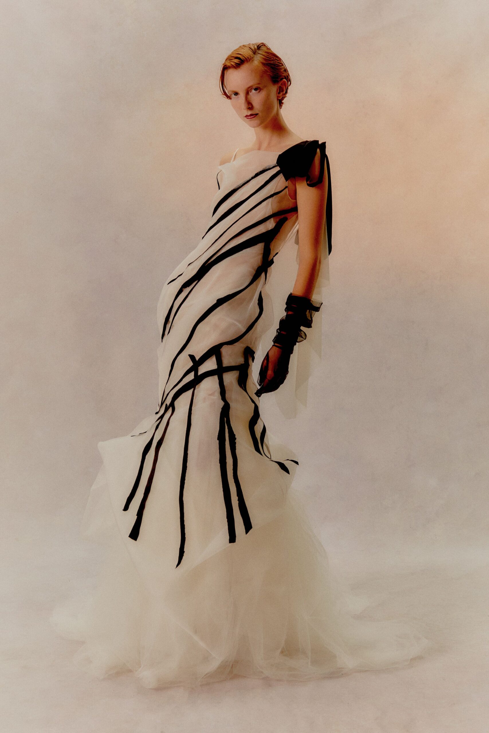 white and black striped gown with gloves